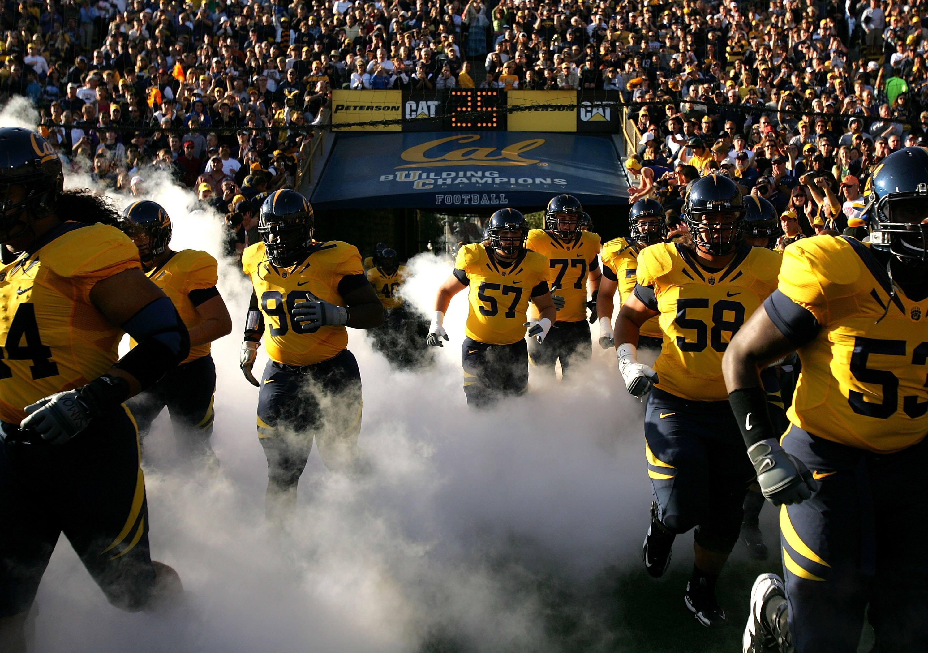 BERKELEY, CA - OCTOBER 03:  The California Golden Bears enter the stadium before their game against the USC Trojans at California Memorial Stadium on October 3, 2009 in Berkeley, California.  (Photo by Ezra Shaw/Getty Images)