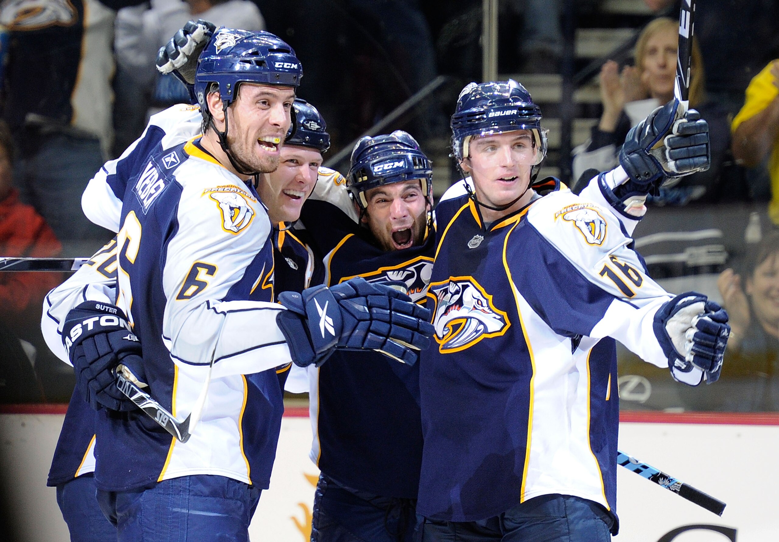 NASHVILLE, TN - OCTOBER 09:  Shea Weber #6, Ryan Suter #20, and Cal O'Reilly #16, congratulate Steve Sullivan, center, on scoring a goal against the Anaheim Ducks on October 9, 2010 in Nashville, Tennessee.  (Photo by Frederick Breedon/Getty Images)