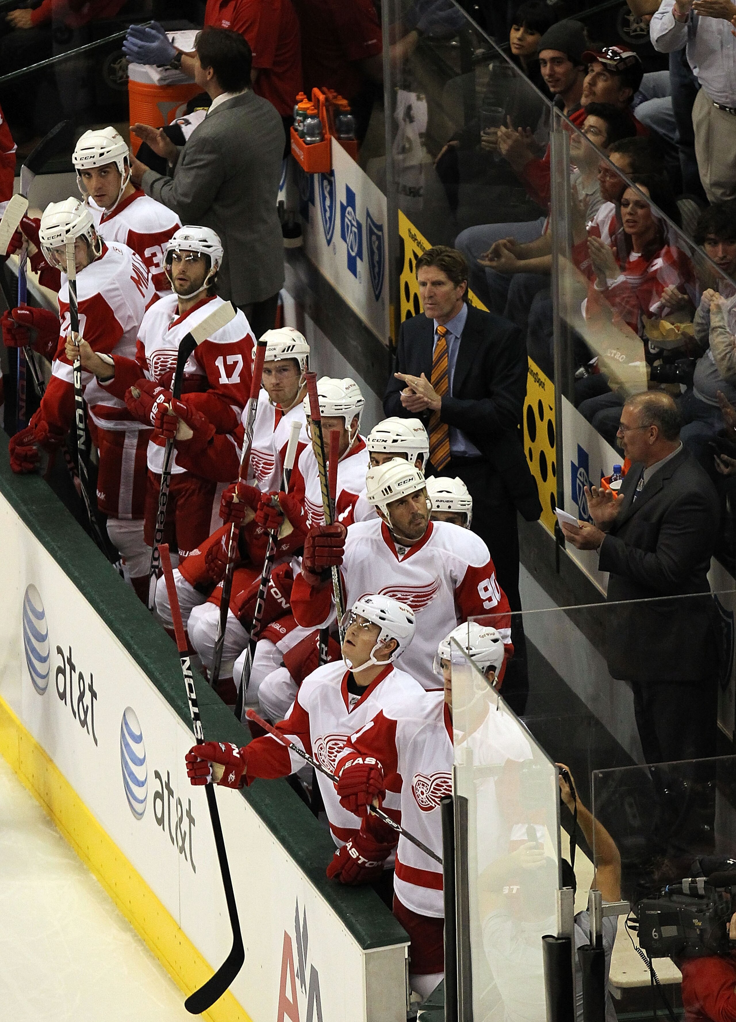 DALLAS - OCTOBER 14:  Center Mike Modano #90 of the Detroit Red Wings waves to the crowd after being acknowledged on the big screen during play against the Dallas Stars at American Airlines Center on October 14, 2010 in Dallas, Texas.  (Photo by Ronald Ma