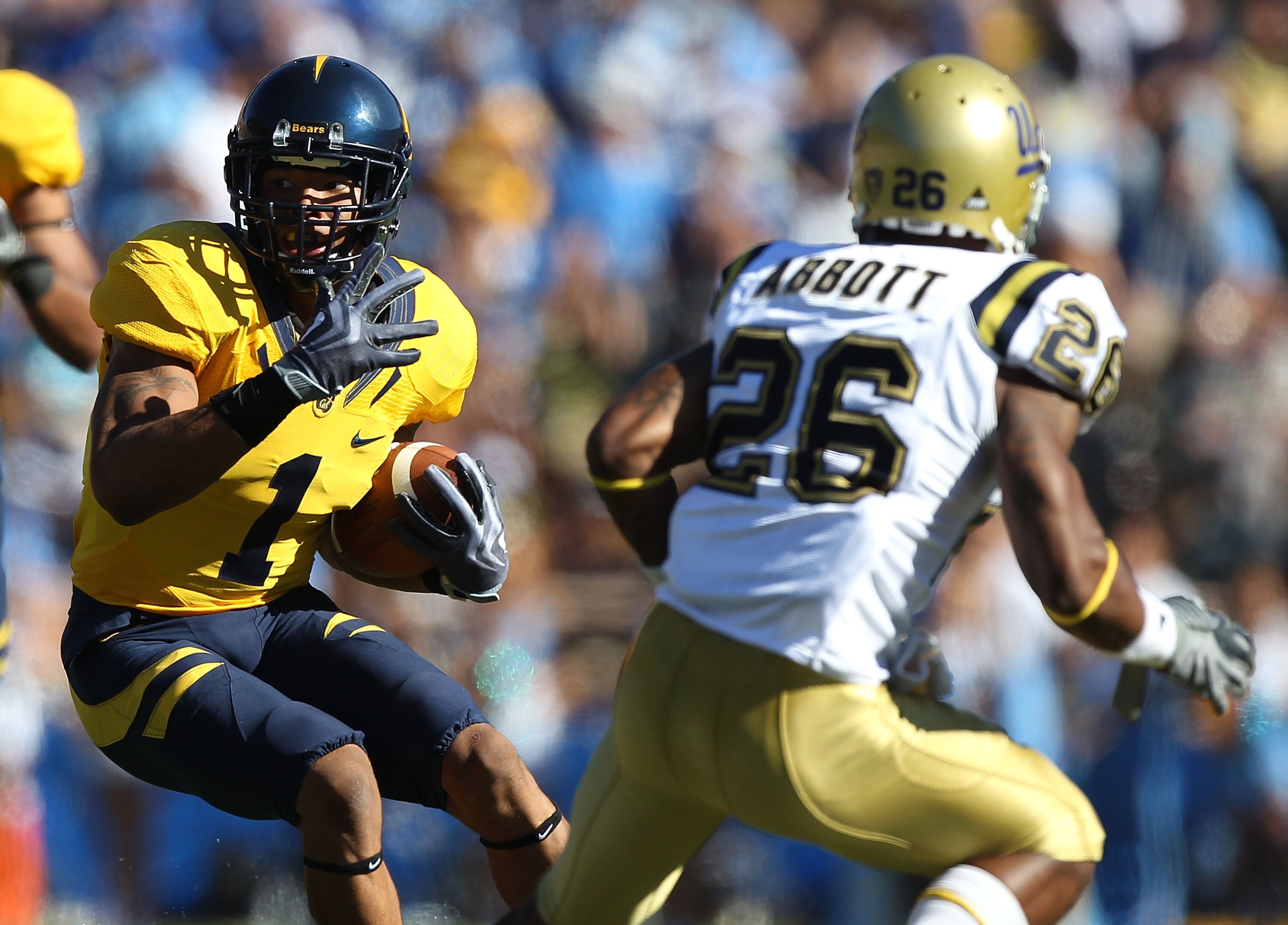 BERKELEY, CA - OCTOBER 09: Marvin Jones #1 of the California Golden Bears runs for a touchdown against Andrew Abbott #26 of the UCLA Bruins at California Memorial Stadium on October 9, 2010 in Berkeley, California. (Photo by Jed Jacobsohn/Getty Images)