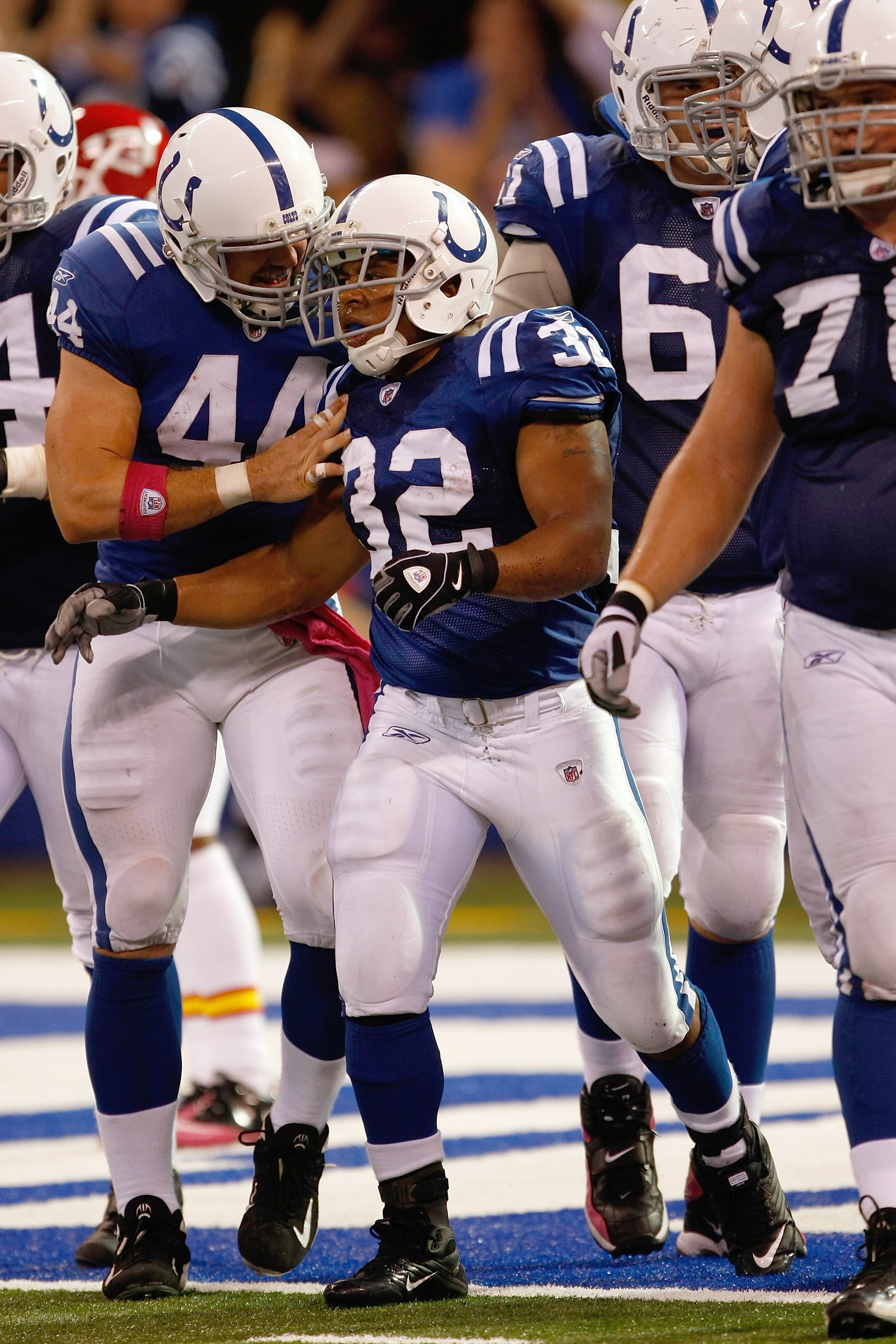 INDIANAPOLIS, IN - OCTOBER 10: Mike Hart #32 of the Indianapolis Colts is congratulated by Dallas Clark after scoring a touchdown against the Kansas City Chiefs at Lucas Oil Stadium on October 10, 2010 in Indianapolis, Indiana. The Colts defeated the Chie