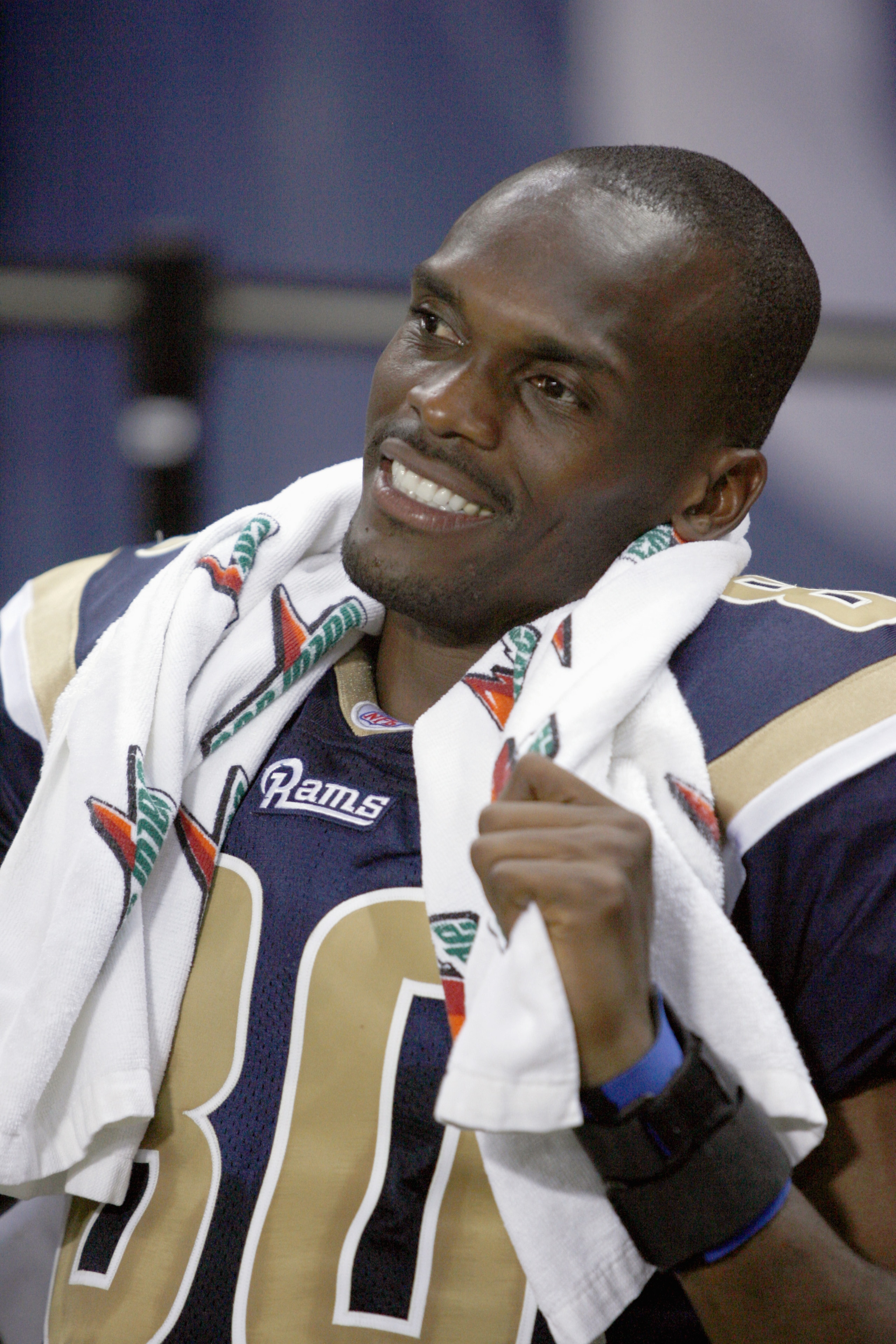 ST. LOUIS - AUGUST 10: Isaac Bruce #80 of the St. Louis Rams smiles on the bench during the preseason game against the Indianapolis Colts at the Edward Jones Dome on August 10, 2006 in St. Louis, Missouri. (Photo by: Dilip Vishwanat/Getty Images)