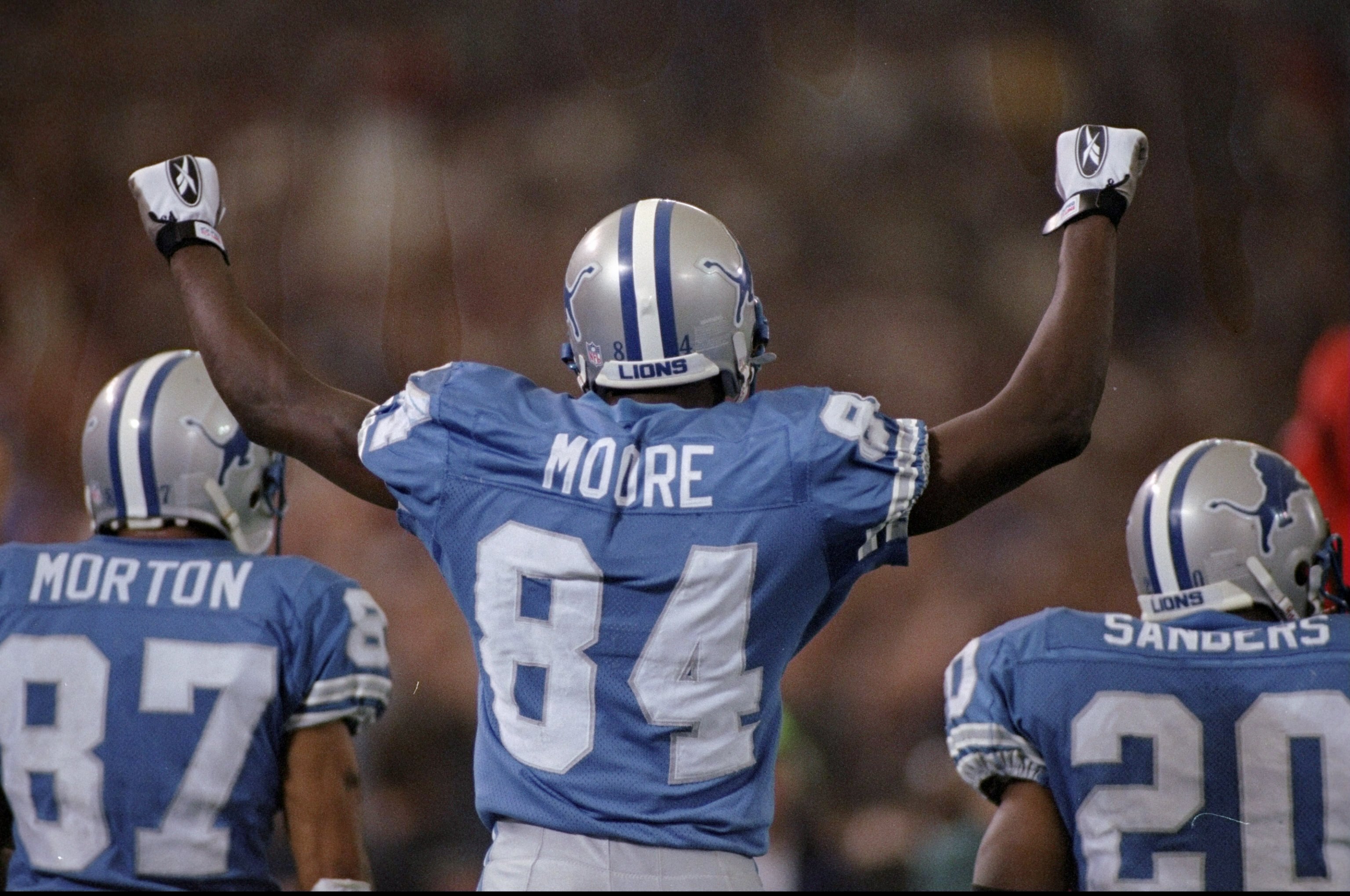 27 Nov 1997:  Wide receiver Herman Moore #84 of the Detroit Lions celebrates during the Lions 55-20 win over the Chicago Bears at the Pontiac Silverdome in Detroit, Michigan. Mandatory Credit: Tim Broekema  /Allsport
