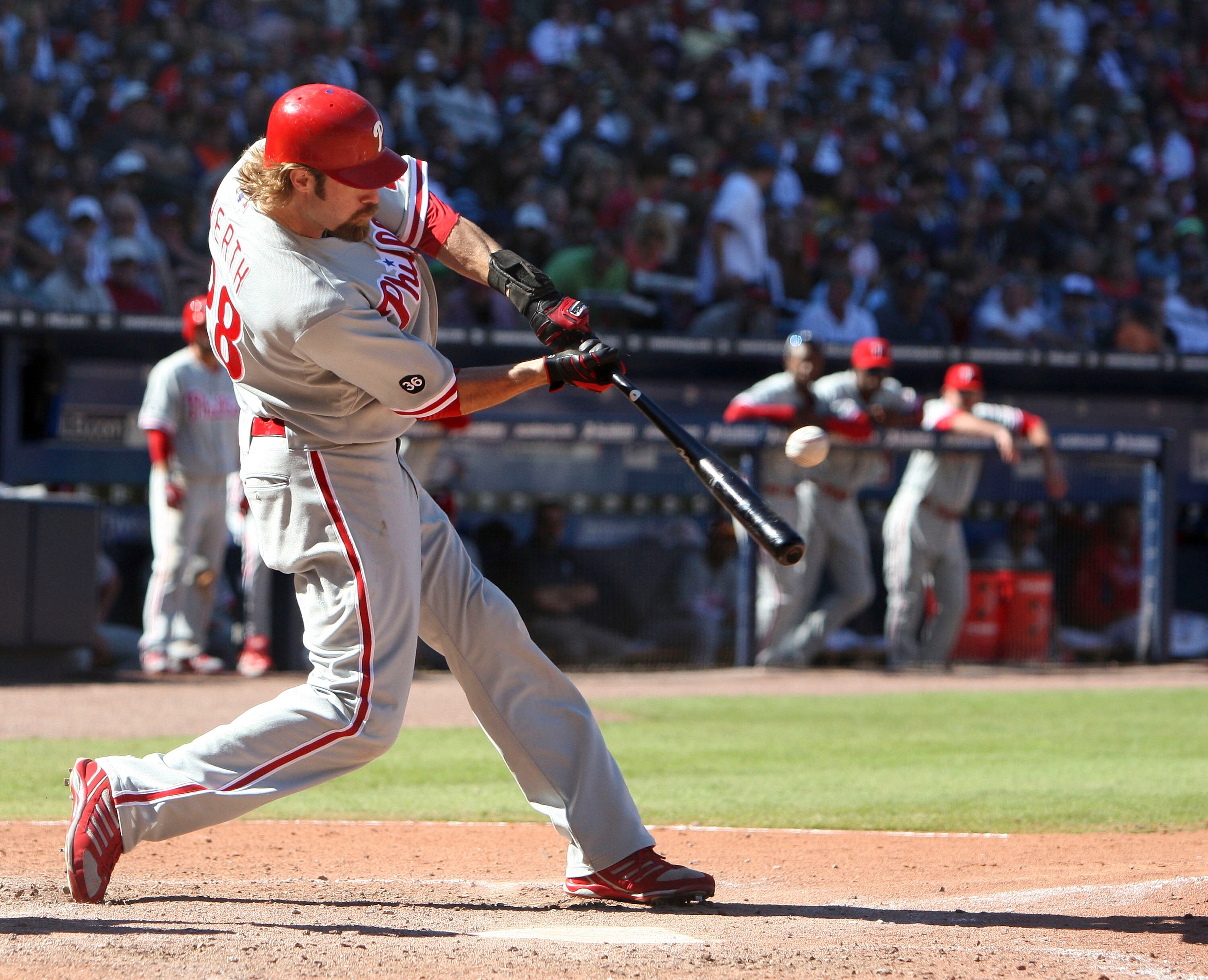 ATLANTA - OCTOBER 3:  Outfielder Jason Werth #28 of the Philadelphia Phillies connects for a two run home run during the game against the Atlanta Braves at Turner Field on October 3, 2010 in Atlanta, Georgia.  The Braves beat the Phillies 8-7.  (Photo by
