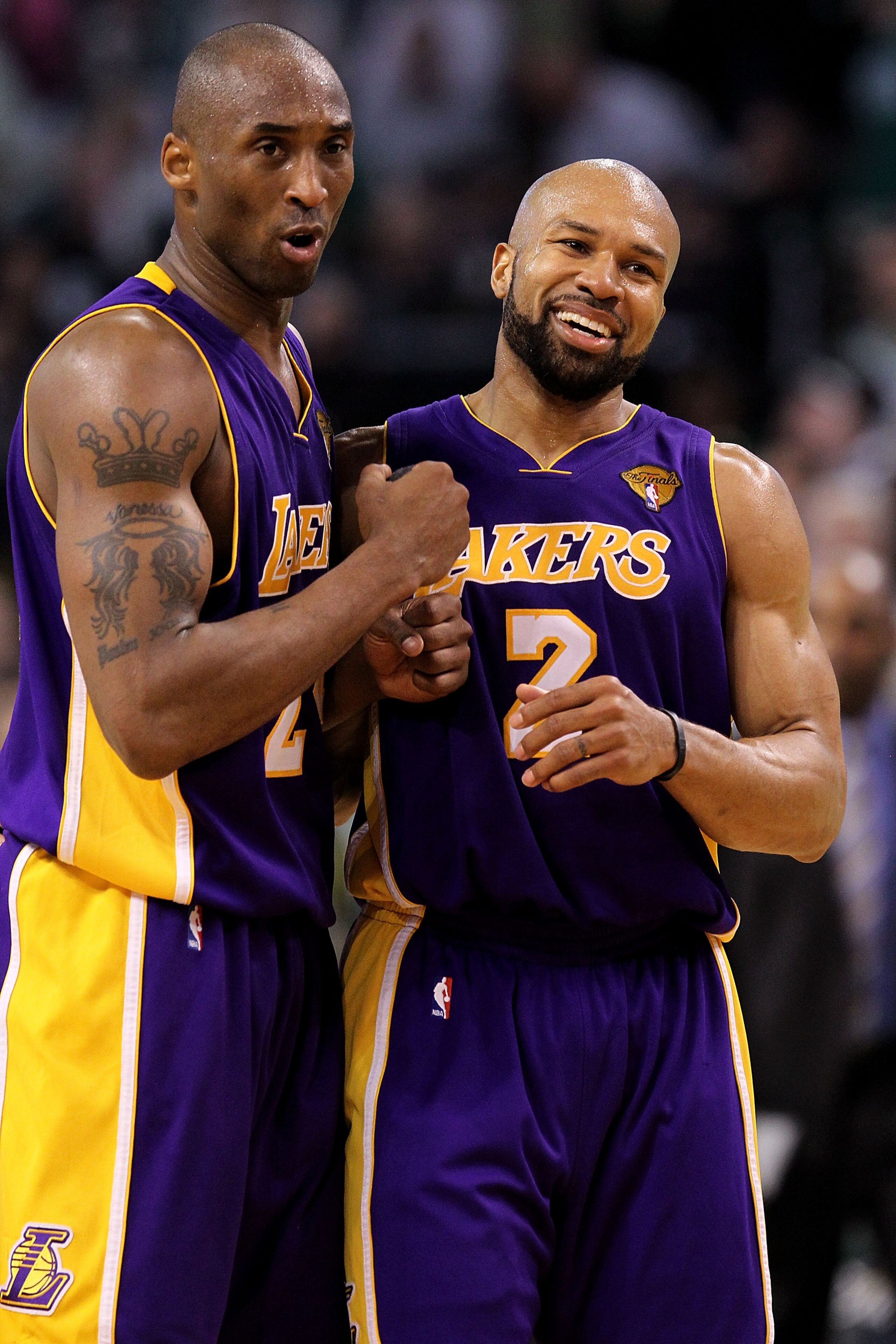 BOSTON - JUNE 08:  Kobe Bryant #24 and Derek Fisher #2 of the Los Angeles Lakers celebrate a play in the fourth quarter against the Boston Celtics in Game Three of the 2010 NBA Finals on June 8, 2010 at TD Garden in Boston, Massachusetts. NOTE TO USER: Us