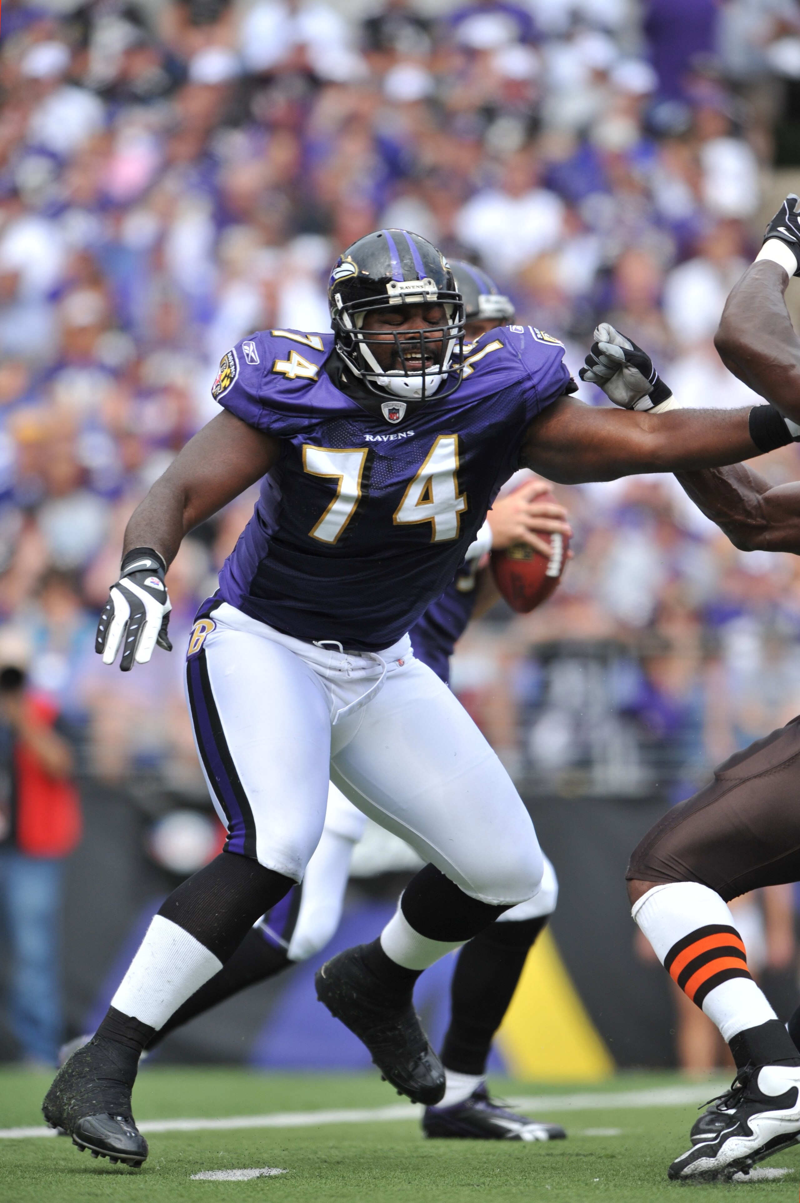 BALTIMORE - SEPTEMBER 27:  Michael Oher #74 of the Baltimore Ravens defends against the Cleveland Browns at M&T Bank Stadium on September 27, 2009 in Baltimore, Maryland. The Ravens defeated the Browns 34-3. (Photo by Larry French/Getty Images)