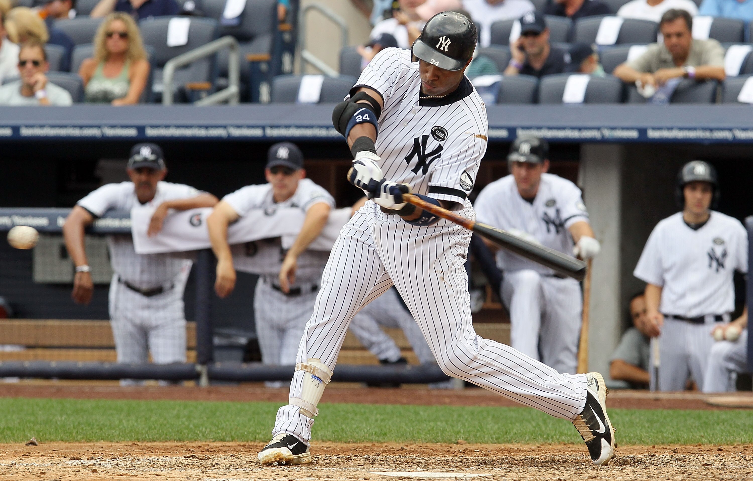 NEW YORK - AUGUST 04:  Robinson Cano #24 of the New York Yankees bats against the Toronto Blue Jays on August 4, 2010 at Yankee Stadium in the Bronx borough of New York City.  (Photo by Jim McIsaac/Getty Images)