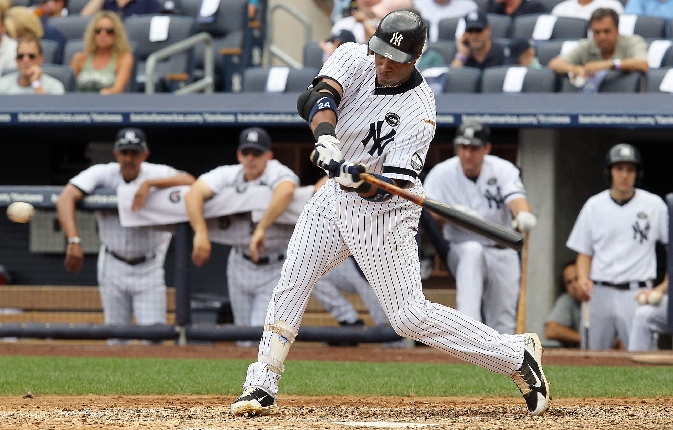 NEW YORK - AUGUST 04:  Robinson Cano #24 of the New York Yankees bats against the Toronto Blue Jays on August 4, 2010 at Yankee Stadium in the Bronx borough of New York City.  (Photo by Jim McIsaac/Getty Images)