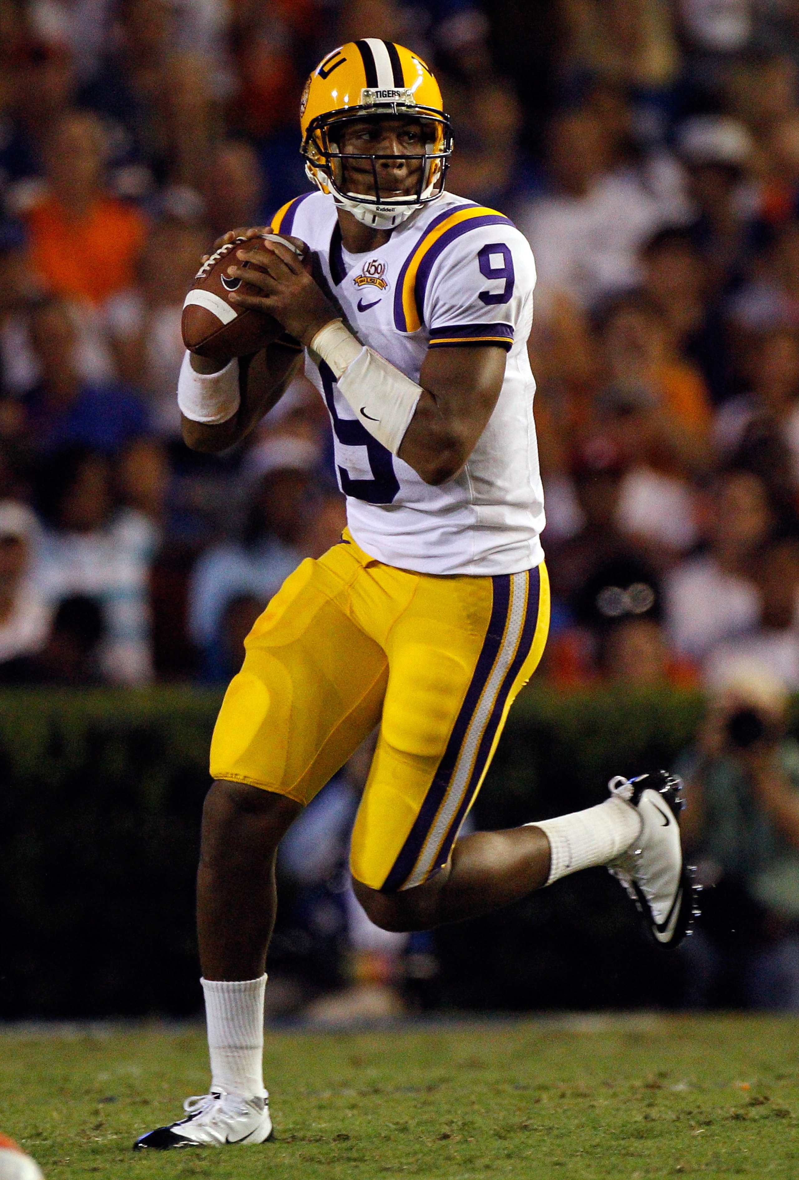 GAINESVILLE, FL - OCTOBER 09:  Quarterback Jordan Jefferson #9 of the Lousinana State University Tigers throws a pass during the game against the Florida Gators at Ben Hill Griffin Stadium on October 9, 2010 in Gainesville, Florida.  (Photo by Sam Greenwo