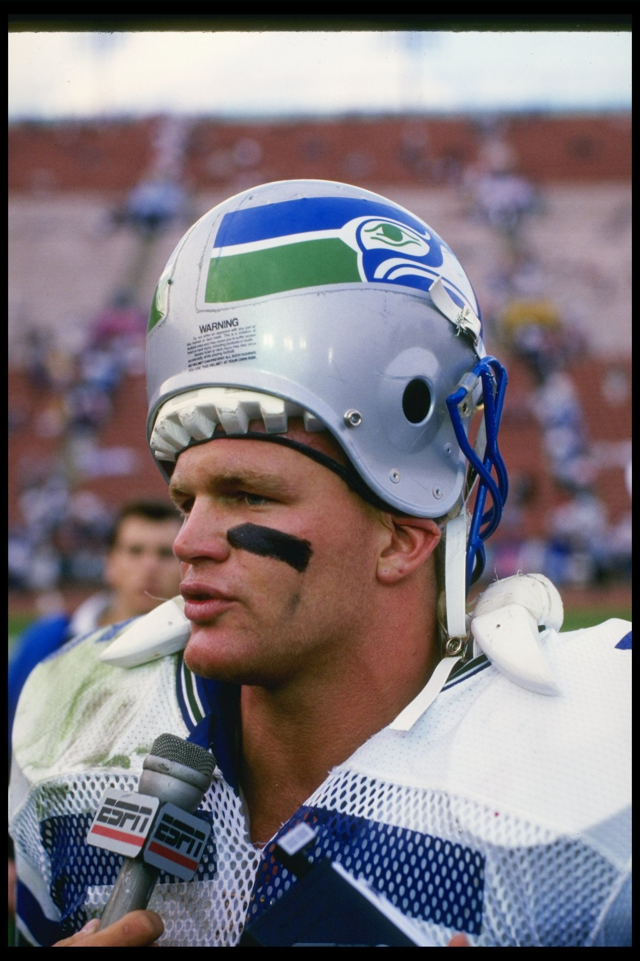 18 Dec 1988: Linebacker Brian Bosworth of the Seattle Seahawks looks on during a game against the Los Angeles Raiders at the Los Angeles Memorial Coliseum in Los Angeles, California. The Seahawks won the game, 43-37.