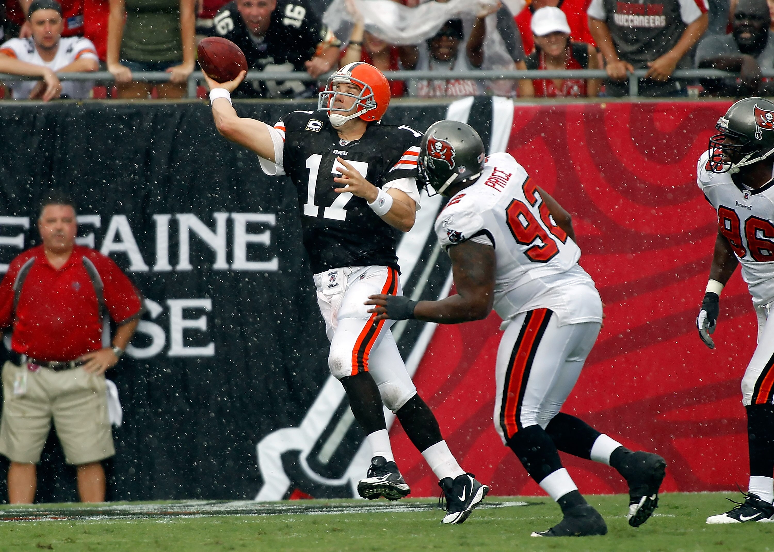 TAMPA, FL - SEPTEMBER 12:  Quarterback Jake Delhomme #17 of the Cleveland Browns throws a pass as defensive tackle Brian Price #92 of the Tampa Bay Buccaneers closes in during the game at Raymond James Stadium on September 12, 2010 in Tampa, Florida.  (Ph