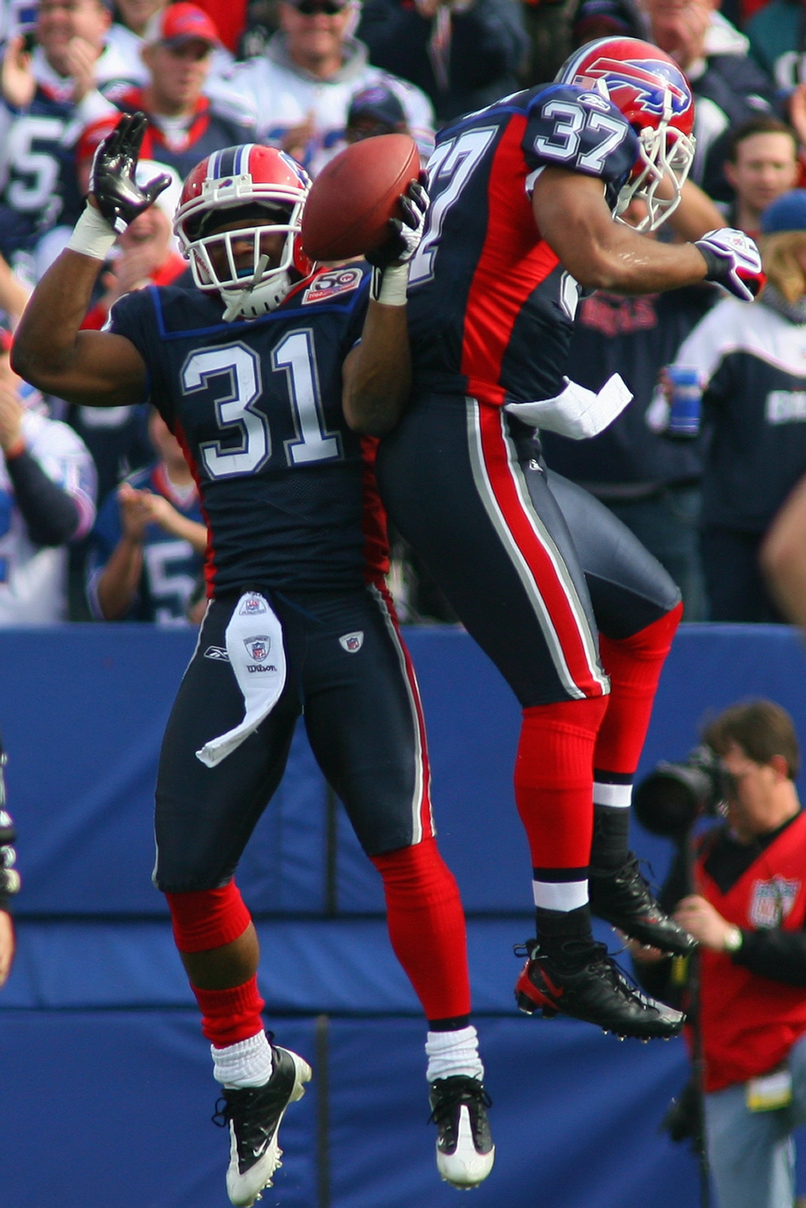 ORCHARD PARK, NY - NOVEMBER 01:  Jairus Byrd #31 and George Wilson #37 of the Buffalo Bills celebrate during the game against the Houston Texans at Ralph Wilson Stadium on November 1, 2009 in Orchard Park, New York. Houston won 31-10. (Photo by Rick Stewa