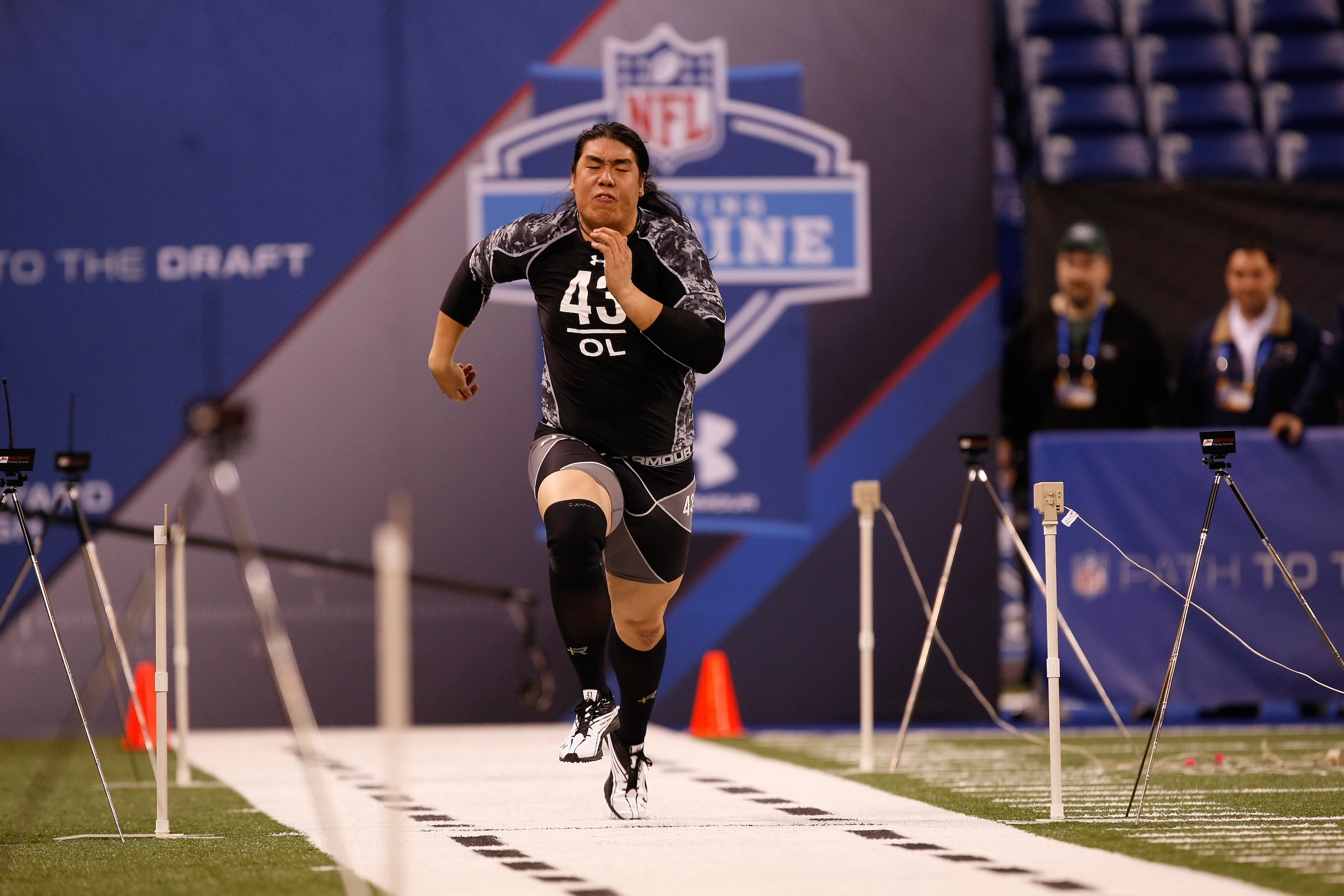 INDIANAPOLIS, IN - FEBRUARY 27: Offensive lineman Ed Wang of Virginia Tech runs the 40 yard dash during the NFL Scouting Combine presented by Under Armour at Lucas Oil Stadium on February 27, 2010 in Indianapolis, Indiana. (Photo by Scott Boehm/Getty Imag