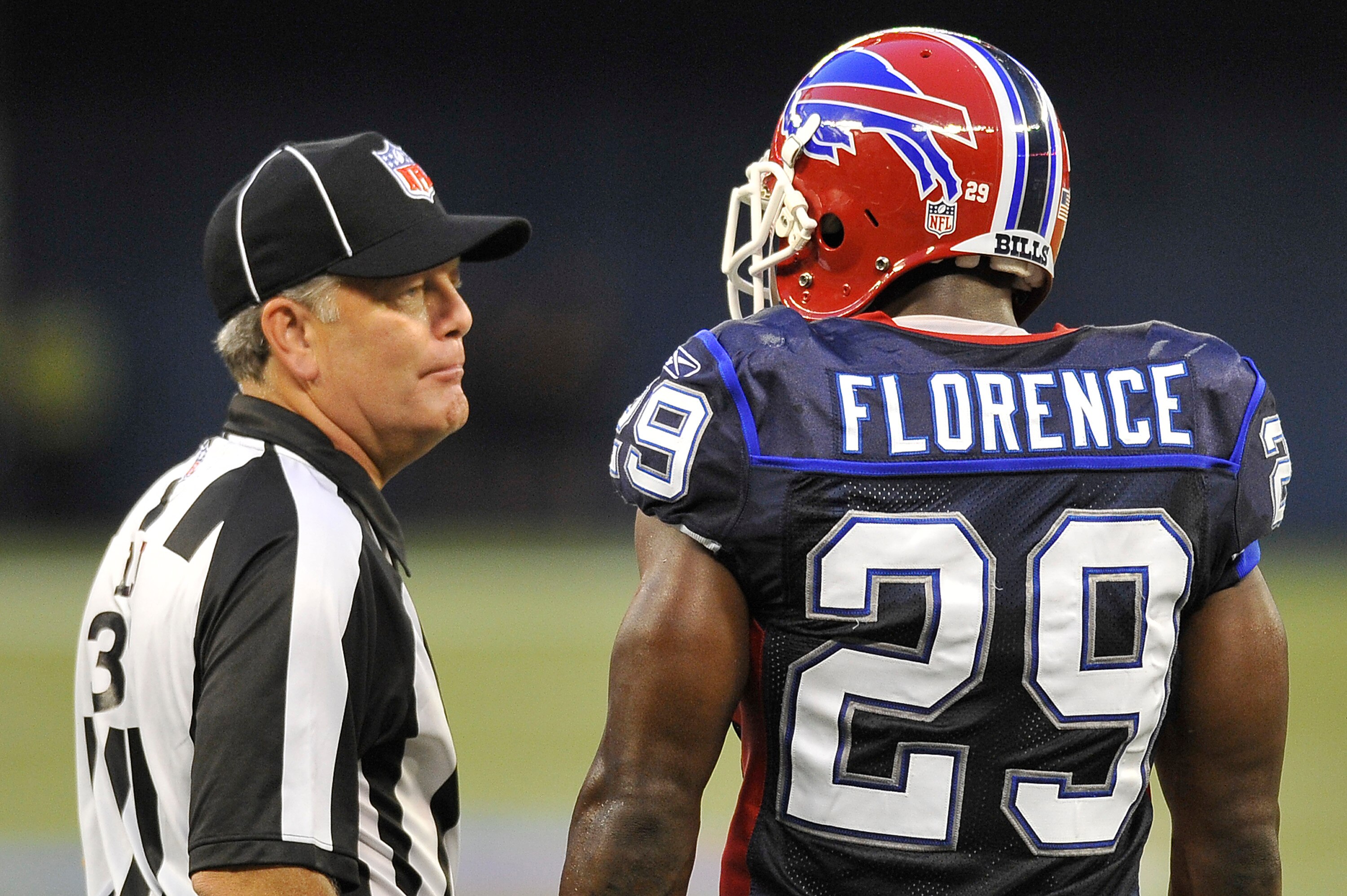 TORONTO, CANADA - AUGUST 19: Field Judge Scott Edwards #3 speaks with Drayton Florence #29 of the Buffalo Bills during a break in game action against the Indianapolis Colts on August 19, 2010 at the Rogers Centre in Toronto, Ontario, Canada. (Photo by Bra