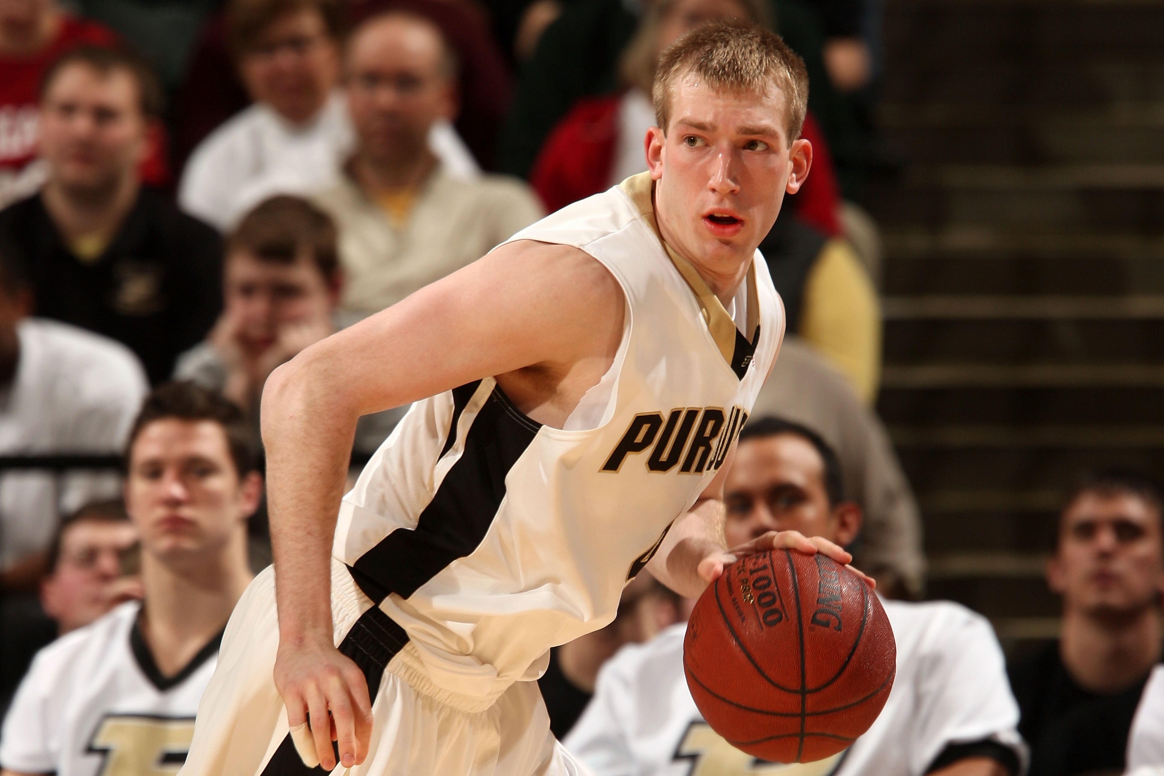 INDIANAPOLIS - MARCH 13:  Robbie Hummel #4 of the Purdue Boilermakers brings the ball up court against the Penn State Nittany Lions during the second round of the Big Ten Men's Basketball Tournament at Conseco Fieldhouse on March 13, 2009 in Indianapolis,