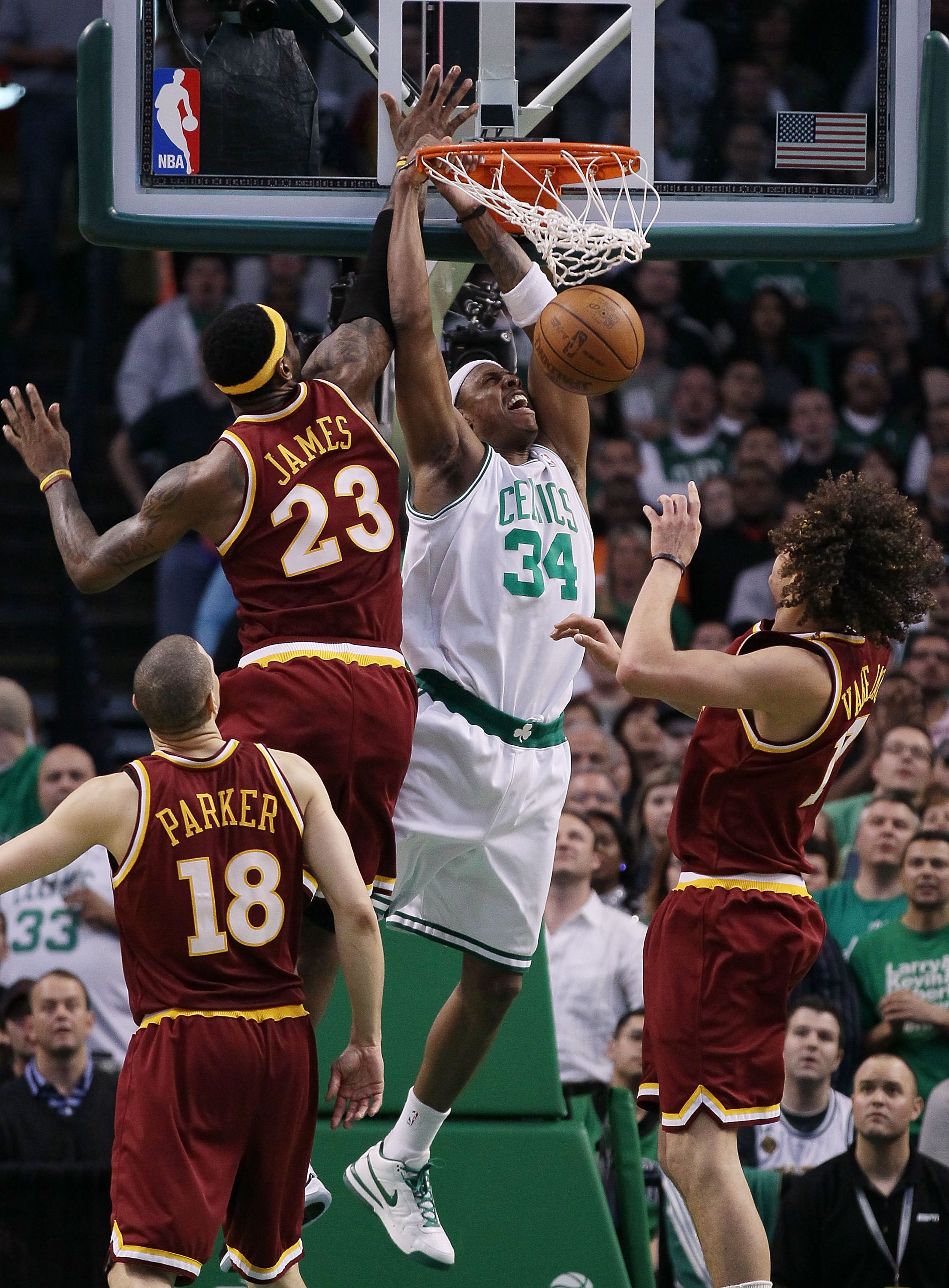 BOSTON - MAY 09:   Paul Pierce #34 of the Boston Celtics dunks the ball as LeBron James #23 and Anderson Varejao #17 of the Cleveland Cavaliers defend during Game Four of the Eastern Conference Semifinals of the 2010 NBA playoffs at TD Garden on May 9, 20