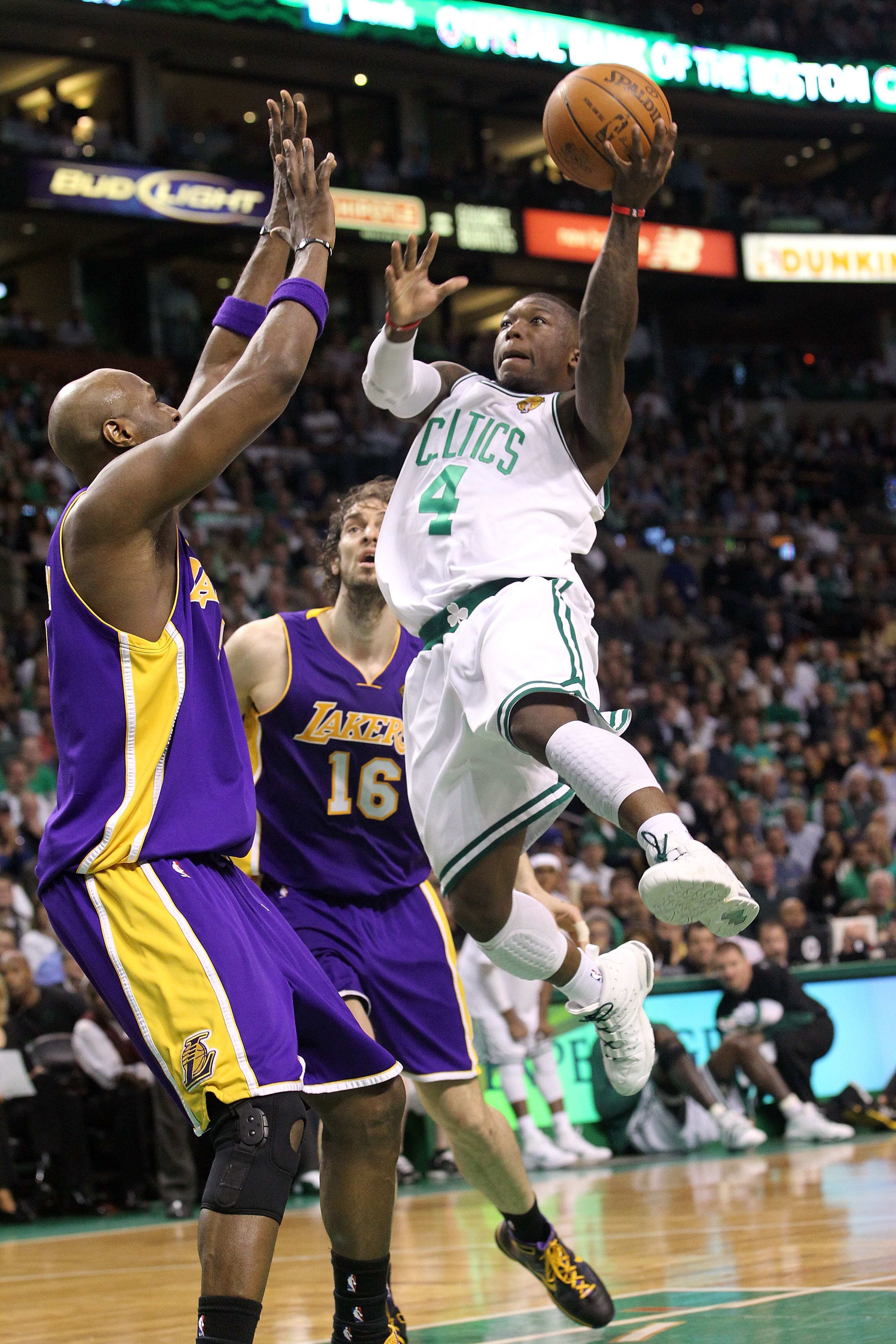 BOSTON - JUNE 10:  Nate Robinson #4 of the Boston Celltics drives for a shot attempt Lamar Odom #7 of the Los Angeles Lakers during Game Four of the 2010 NBA Finals on June 10, 2010 at TD Garden in Boston, Massachusetts. NOTE TO USER: User expressly ackno