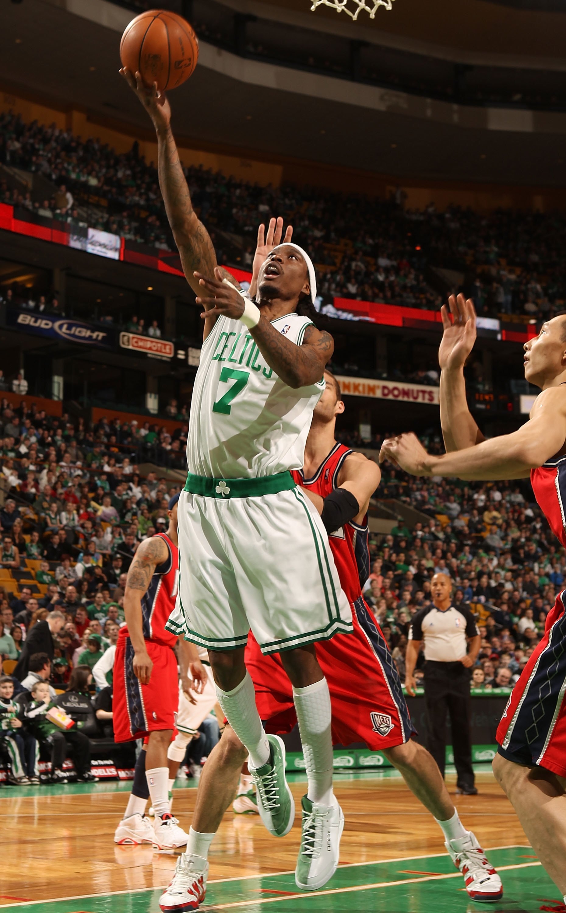 BOSTON - FEBRUARY 27:  Marquis Daniels #7 of the Boston Celtics heads for the net as Brook Lopez #11 of the New Jersey Nets defends at the TD Garden on February 27, 2010 in Boston, Massachusetts. The Nets defeated the Celtics 104-96.  NOTE TO USER: User e