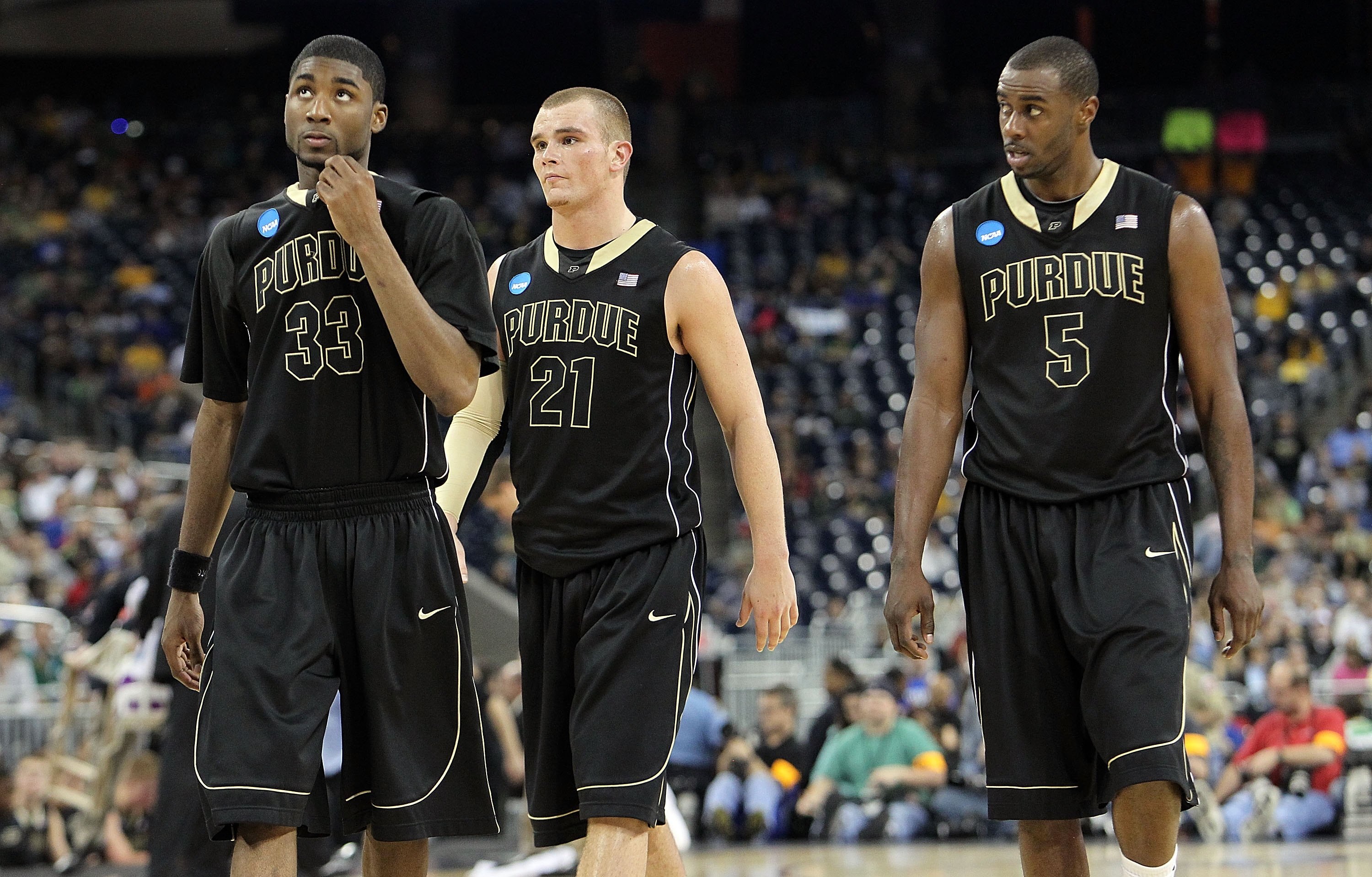 HOUSTON - MARCH 26: (L-R) E'Twaun Moore #33, D.J. Byrd #21 and Keaton Grant #5 of the Purdue Boilermakers during a 70-57 loss against the Duke Blue Devils during the south regional semifinal of the 2010 NCAA men's basketball tournament at Reliant Stadium 