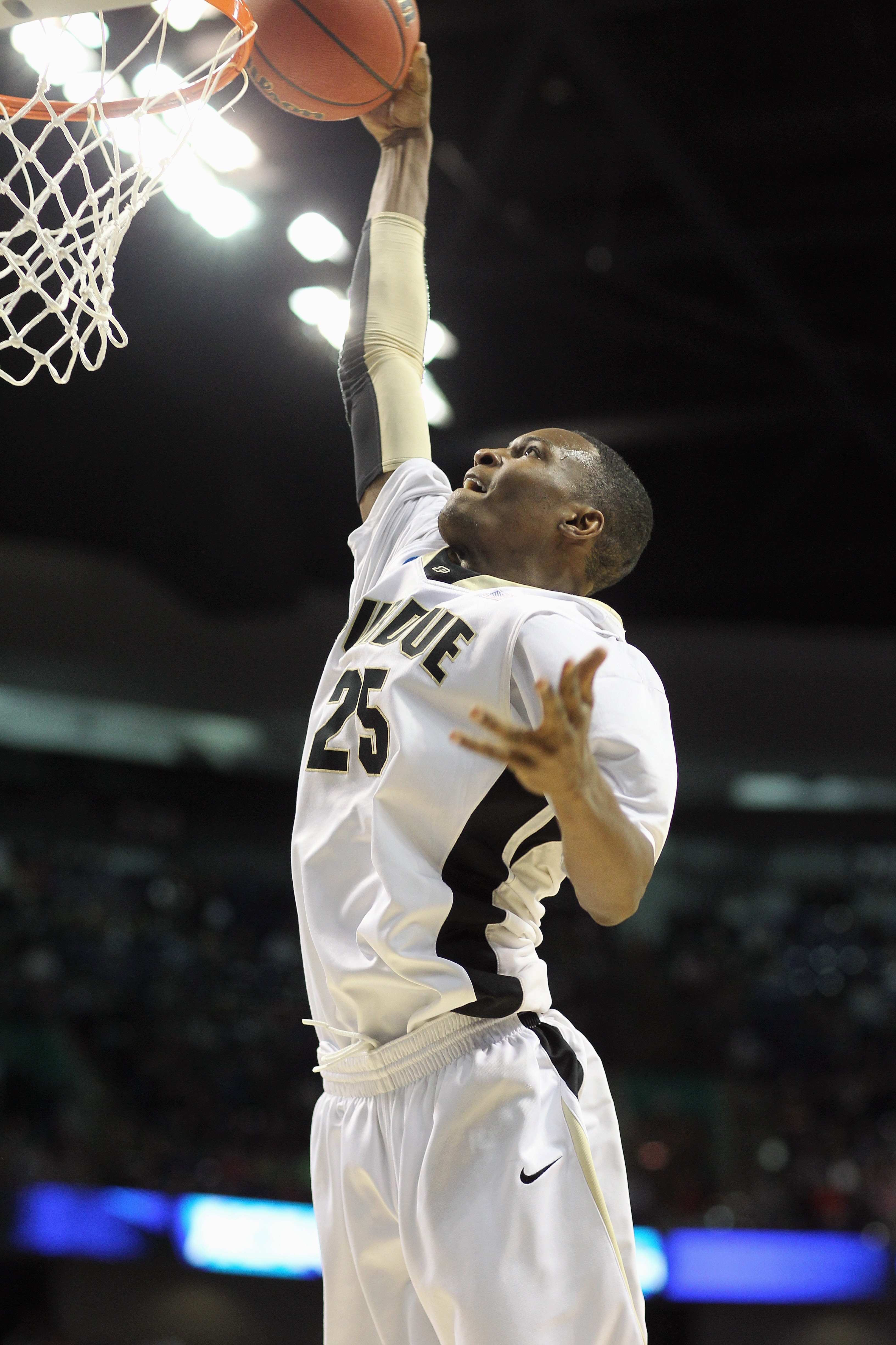 SPOKANE,WA - MARCH 21: JaJuan Johnson #25 of the Purdue Boilermakers dunks the ball against the Texas A&M Aggies during the second round of the 2010 NCAA men's basketball tournament at the Spokane Arena on March 21, 2010 in Spokane, Washington. Purdue def