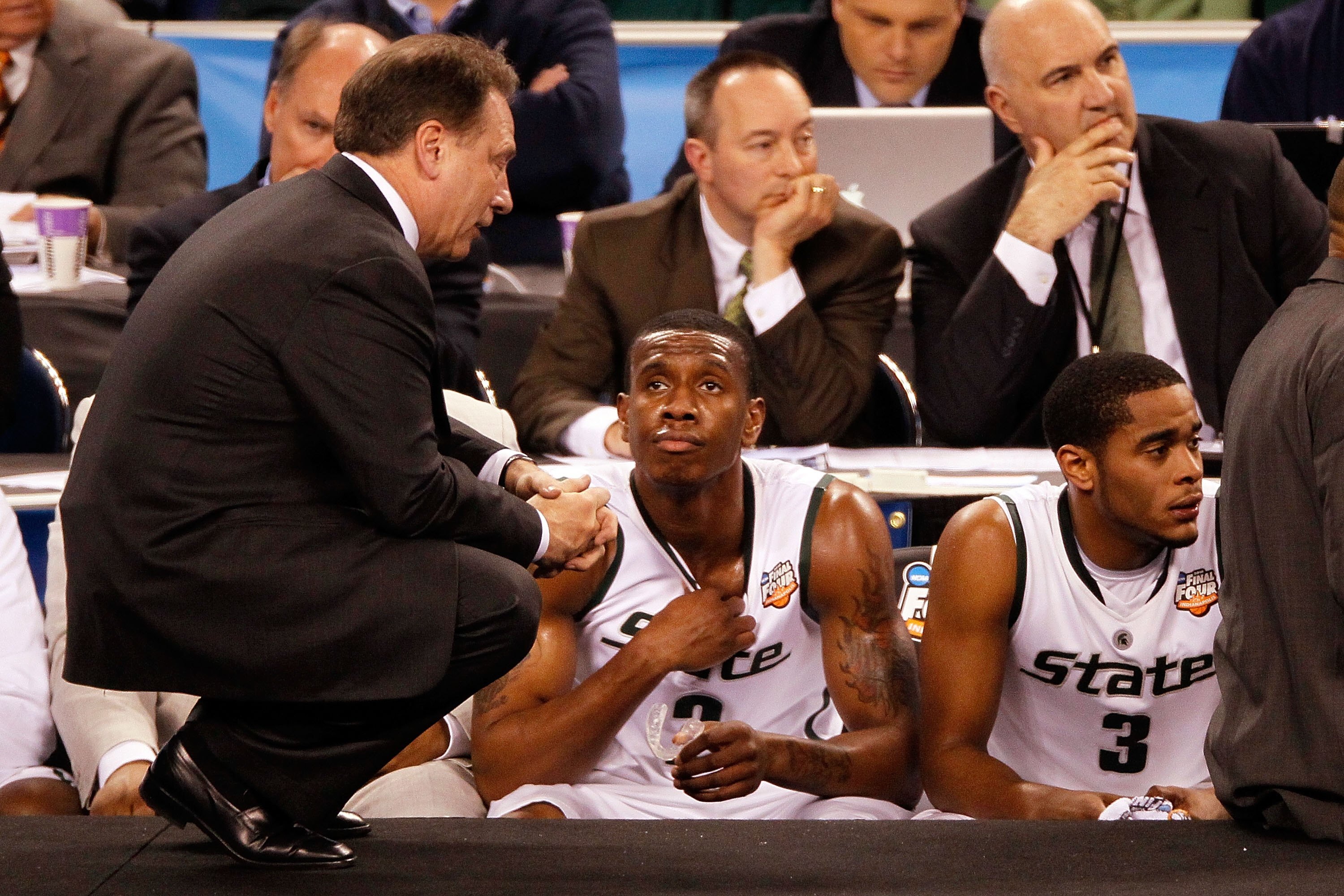 INDIANAPOLIS - APRIL 03:  Head coach Tom Izzo of the Michigan State Spartans talks with Raymar Morgan #2 from the sideline while taking on the Butler Bulldogs during the National Semifinal game of the 2010 NCAA Division I Men's Basketball Championship on 
