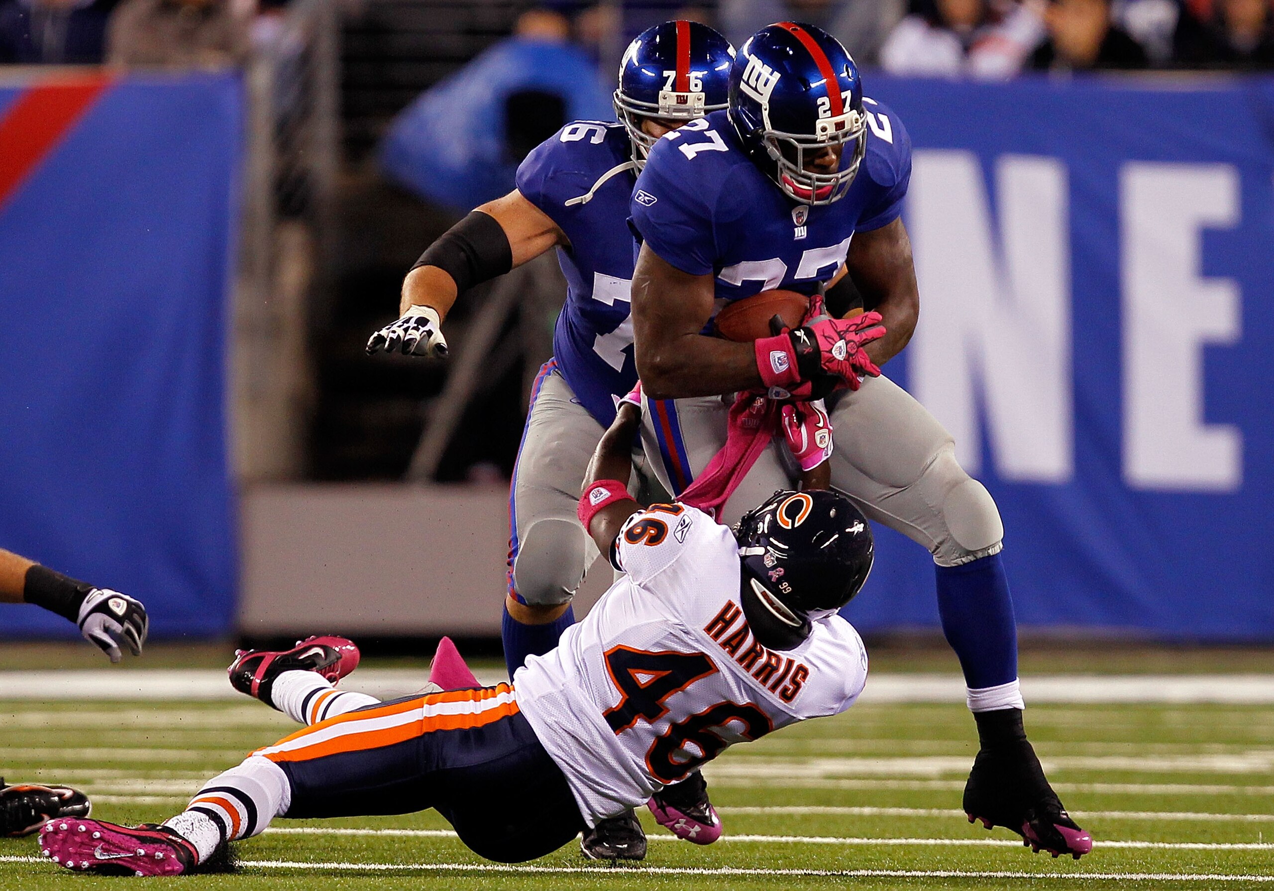 EAST RUTHERFORD, NJ - OCTOBER 03: Chris Harris #46 of the Chicago Bears tries to tackle Brandon Jacobs #27 of the New York Giants at New Meadowlands Stadium on October 3, 2010 in East Rutherford, New Jersey. (Photo by Michael Heiman/Getty Images) EAST RUTHERFORD, NJ - OCTOBER 03: Chris Harris #46 of the Chicago Bears tries to tackle Brandon Jacobs #27 of the New York Giants at New Meadowlands Stadium on October 3, 2010 in East Rutherford, New Jersey. (Photo by Michael Heiman/Getty Images)