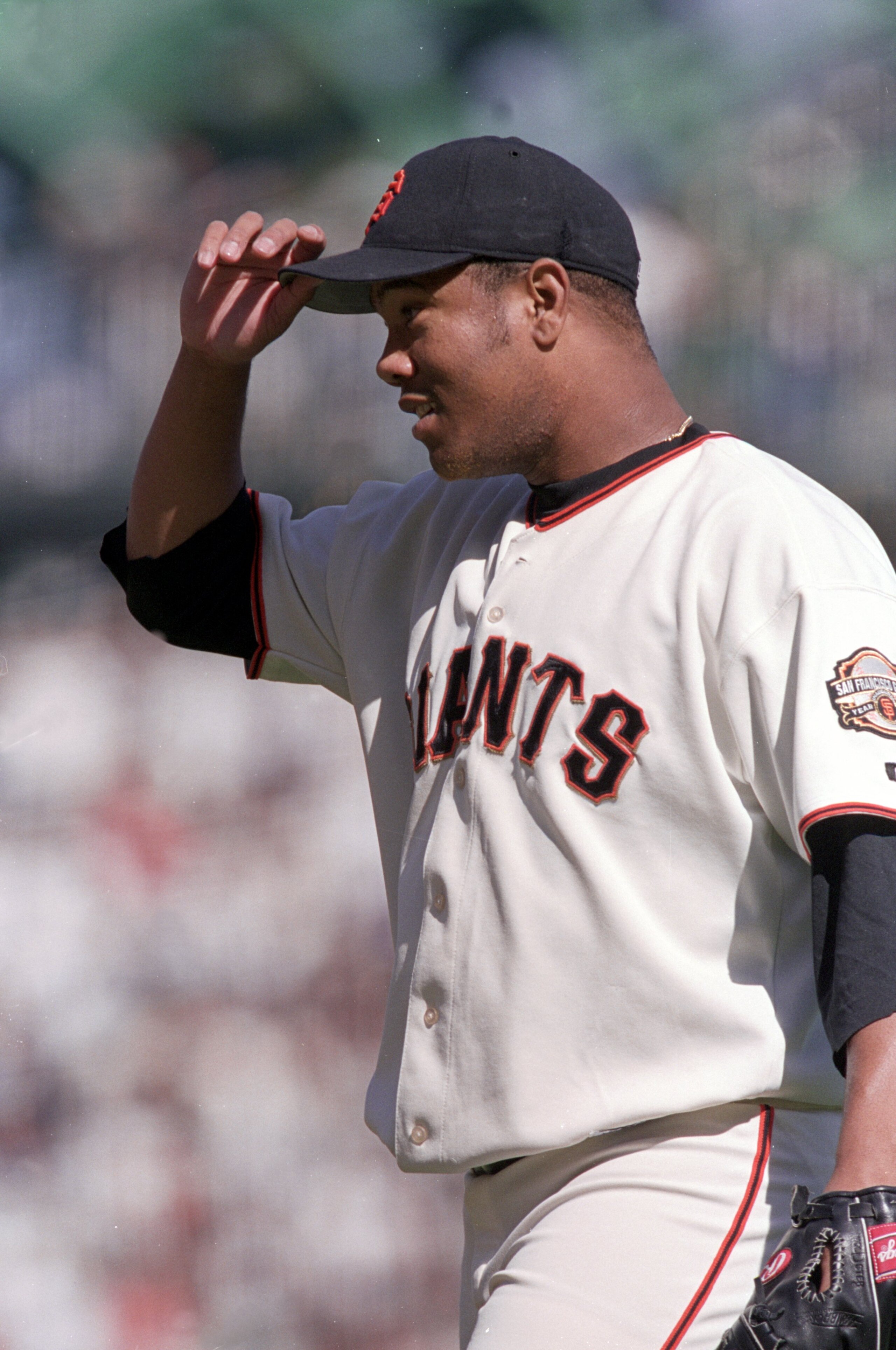 4 Oct 2000:  Livan Hernandez #61 of the San Francisco Giants walks to the mound during the NLDS Game against the New York Mets at Pac Bell Park in San Francisco, California. The Giants defeated the Mets 5-1.Mandatory Credit: Tom Hauck  /Allsport