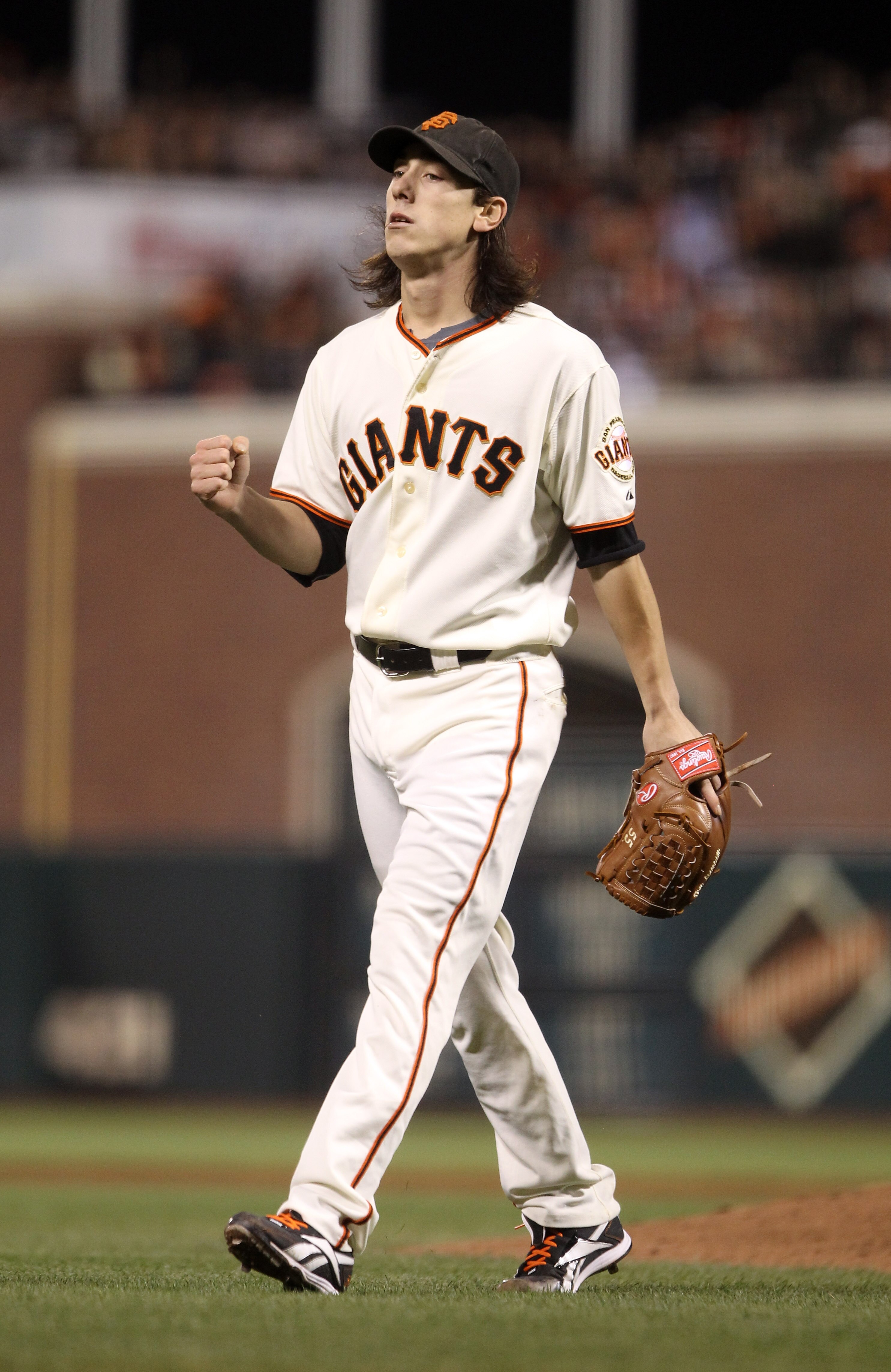 SAN FRANCISCO - OCTOBER 07:  Tim Lincecum #55 of the San Francisco Giants pumps his fist after he got Matt Diaz #23 of the Atlanta Braves to fly out to end the seventh inning with a runner on third base in game 1 of the NLDS at AT&T Park on October 7, 201