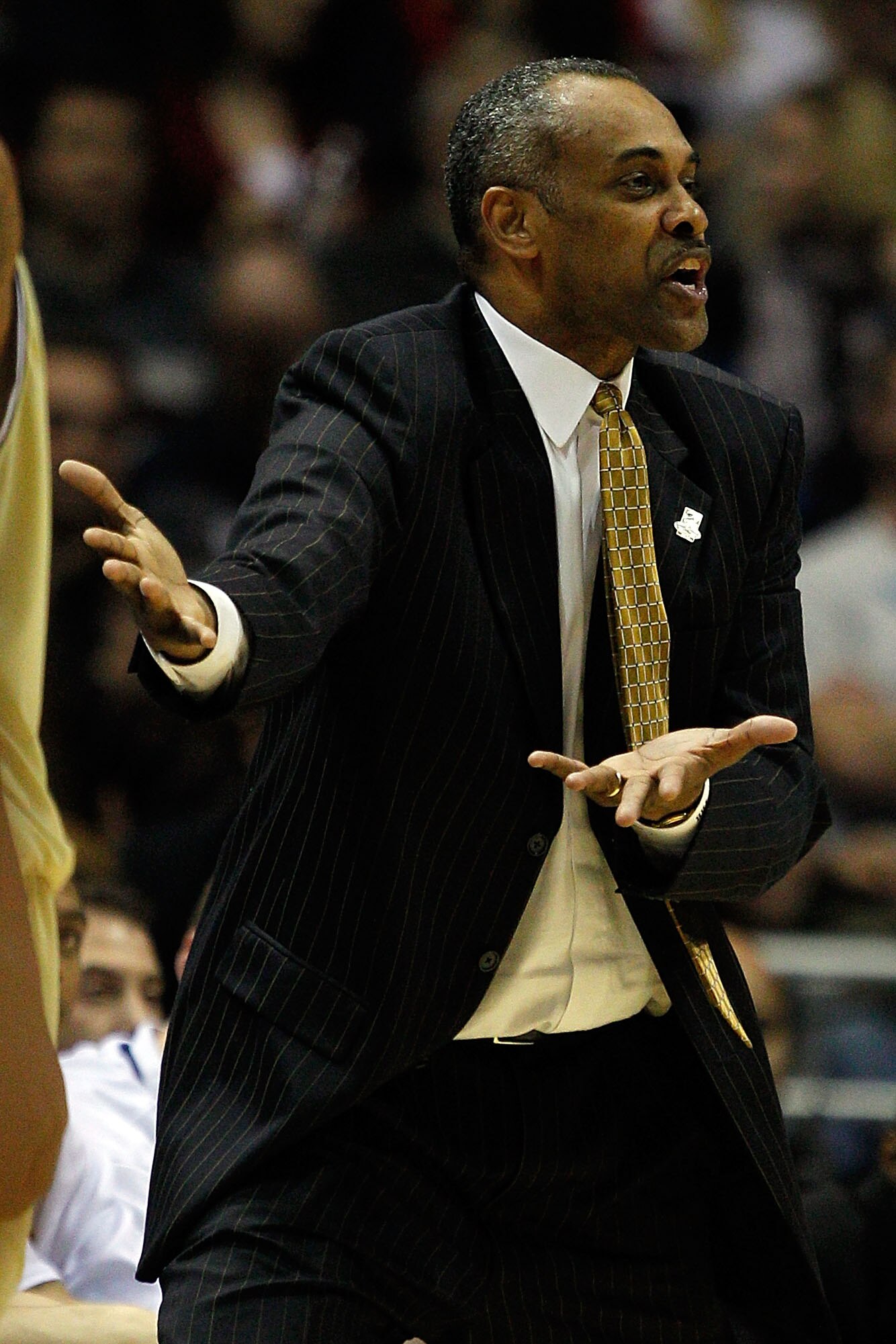 MILWAUKEE - MARCH 21:  Head coach Paul Hewitt of the Georgia Tech Yellow Jackets reacts in the second half while taking on the Ohio State Buckeyes during the second round of the 2010 NCAA men's basketball tournament at the Bradley Center on March 21, 2010