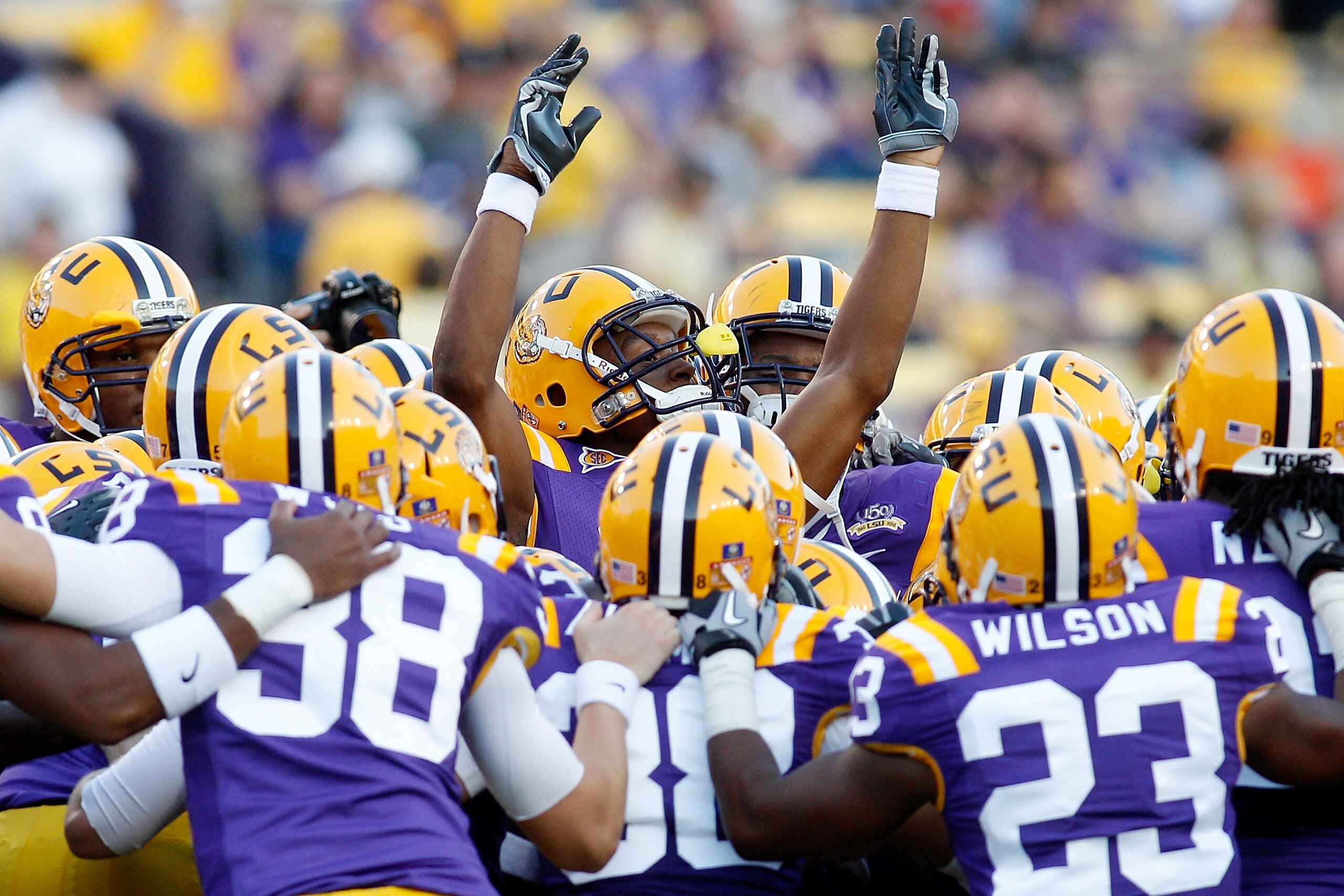 BATON ROUGE, LA - OCTOBER 16:  Members of the Louisiana State University Tigers warm up before playing the McNeese State Cowboys at Tiger Stadium on October 16, 2010 in Baton Rouge, Louisiana.  (Photo by Chris Graythen/Getty Images)