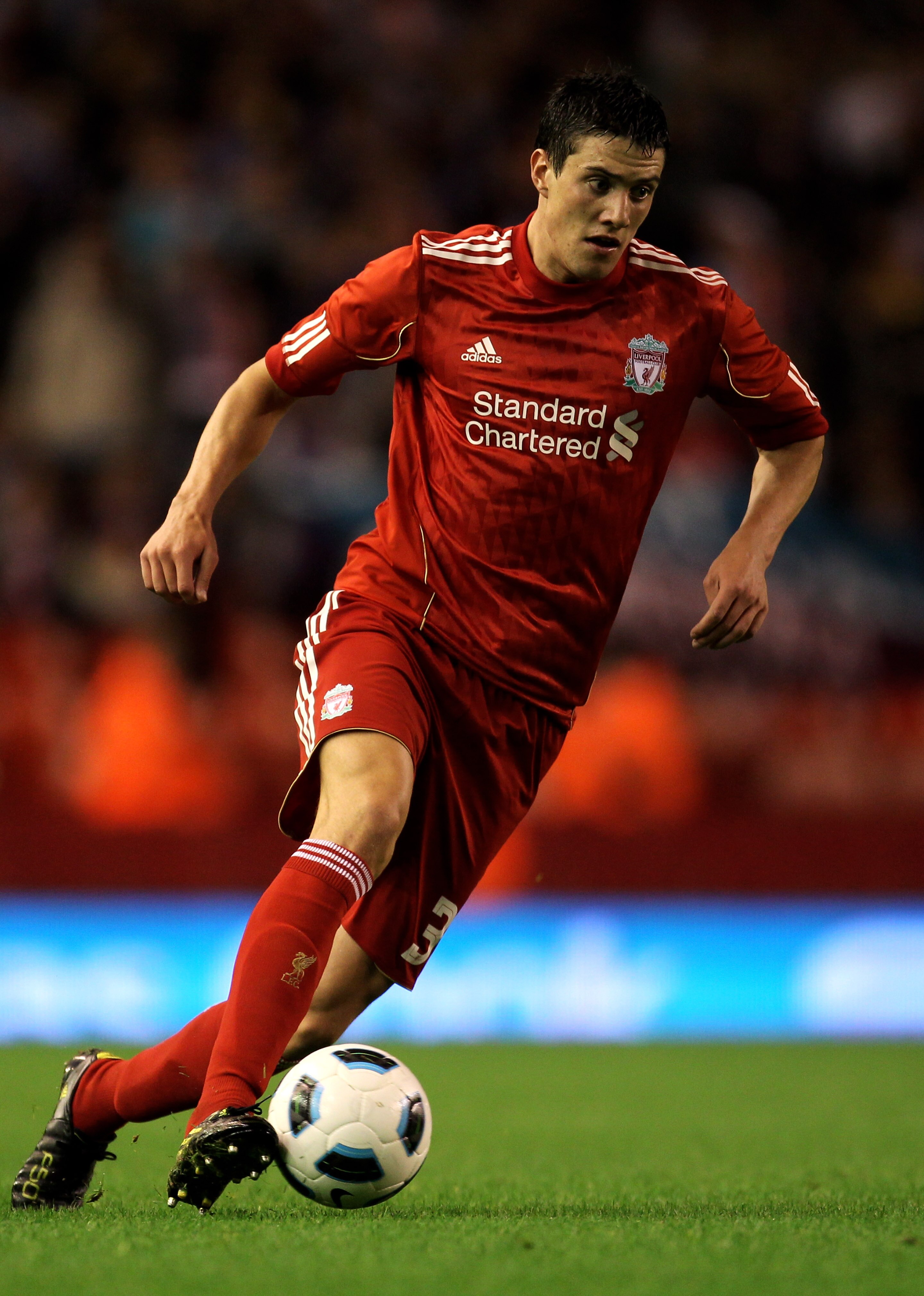 LIVERPOOL, ENGLAND - AUGUST 19:  Martin Kelly of Liverpool in action during the UEFA Europa League play-off first leg match beteween Liverpool and Trabzonspor at Anfield on August 19, 2010 in Liverpool, England.  (Photo by Alex Livesey/Getty Images)