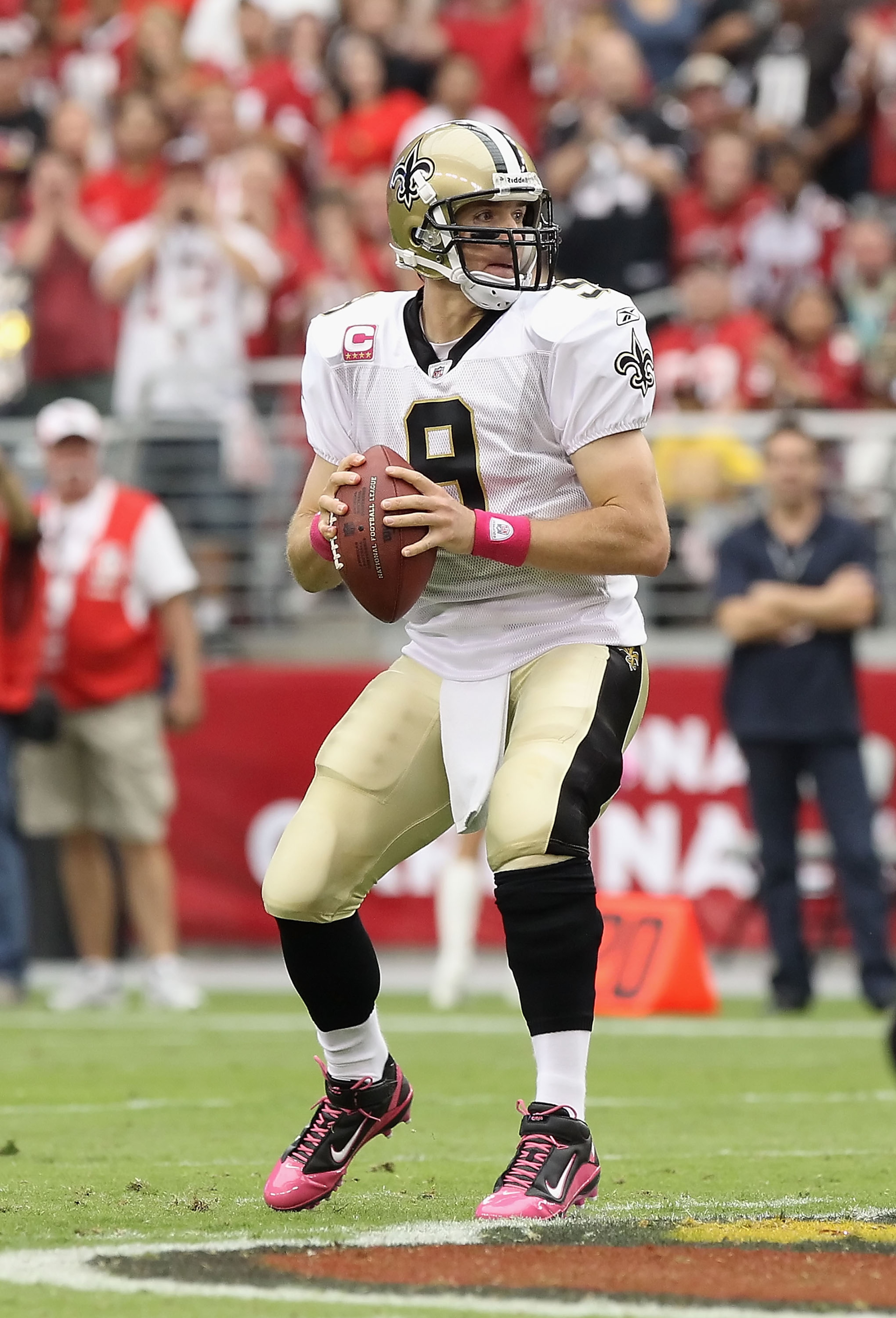 GLENDALE, AZ - OCTOBER 10:  Quarterback Drew Brees #9 of the New Orleans Saints drops back to pass during the NFL game against the Arizona Cardinals at the University of Phoenix Stadium on October 10, 2010 in Glendale, Arizona. The Cardinals defeated the 