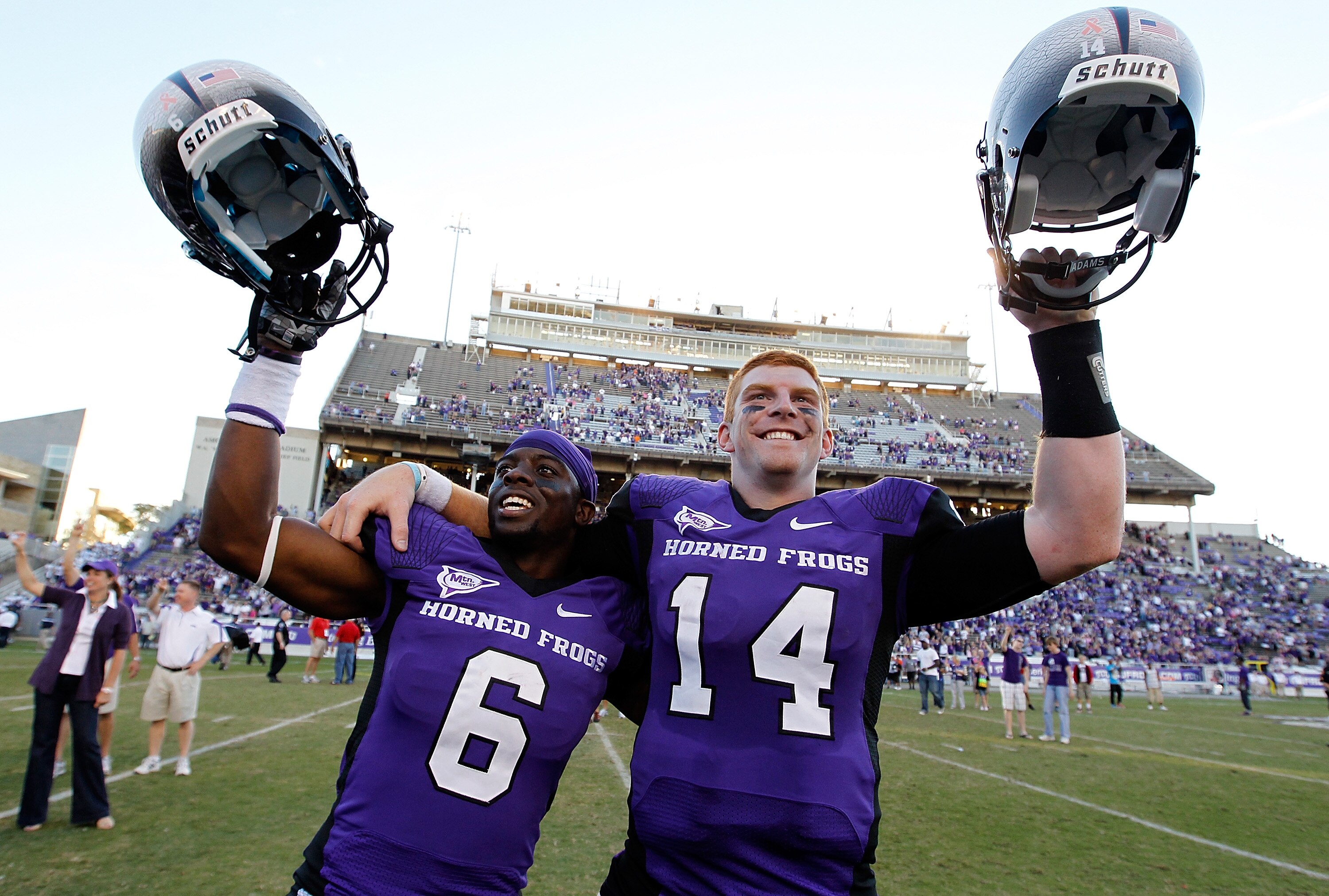 FORT WORTH, TX - OCTOBER 16:  Cornerback Elisha Olabode #6 of the TCU Horned Frogs celebrates with starting quarterback Andy Dalton #14 after TCU beat the BYU Cougars 31-3 at Amon G. Carter Stadium on October 16, 2010 in Fort Worth, Texas.  (Photo by Tom