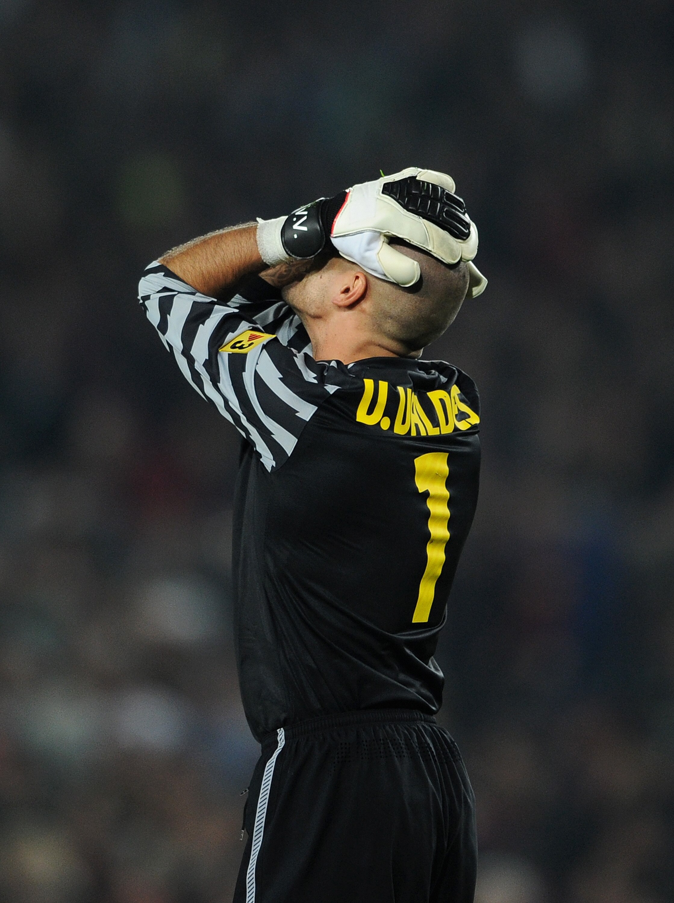 BARCELONA, SPAIN - OCTOBER 16:  Goalkeeper Victor Valdes of Barcelona reacts during the La Liga match between Barcelona and Valencia at the Camp Nou stadium on October 16, 2010 in Barcelona, Spain. Barcelona won the match 2-1.  (Photo by Jasper Juinen/Get