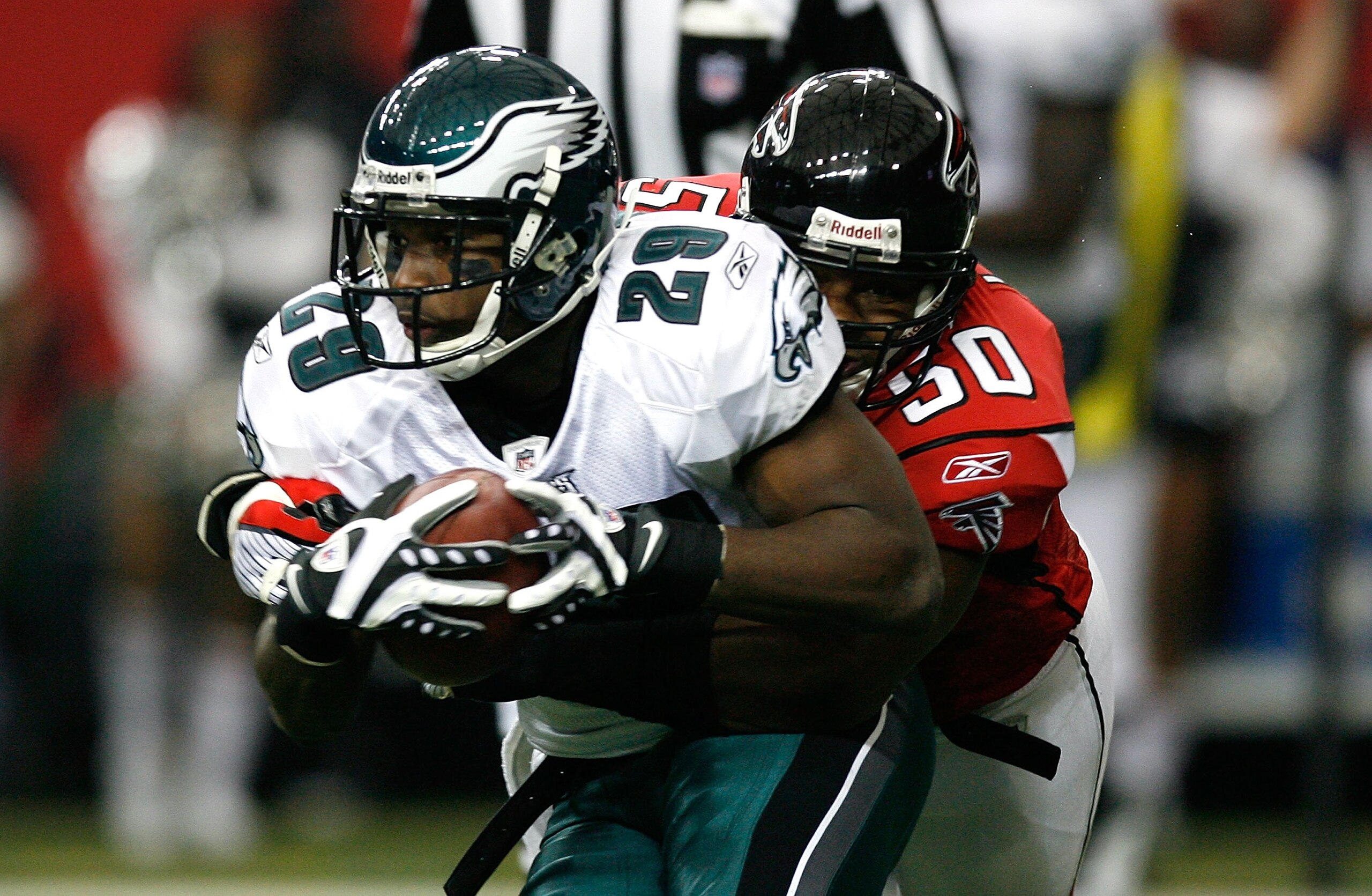 ATLANTA - DECEMBER 06:  LeSean McCoy #29 of the Philadelphia Eagles against Curtis Lofton #50 of the Atlanta Falcons at Georgia Dome on December 6, 2009 in Atlanta, Georgia.  (Photo by Kevin C. Cox/Getty Images)