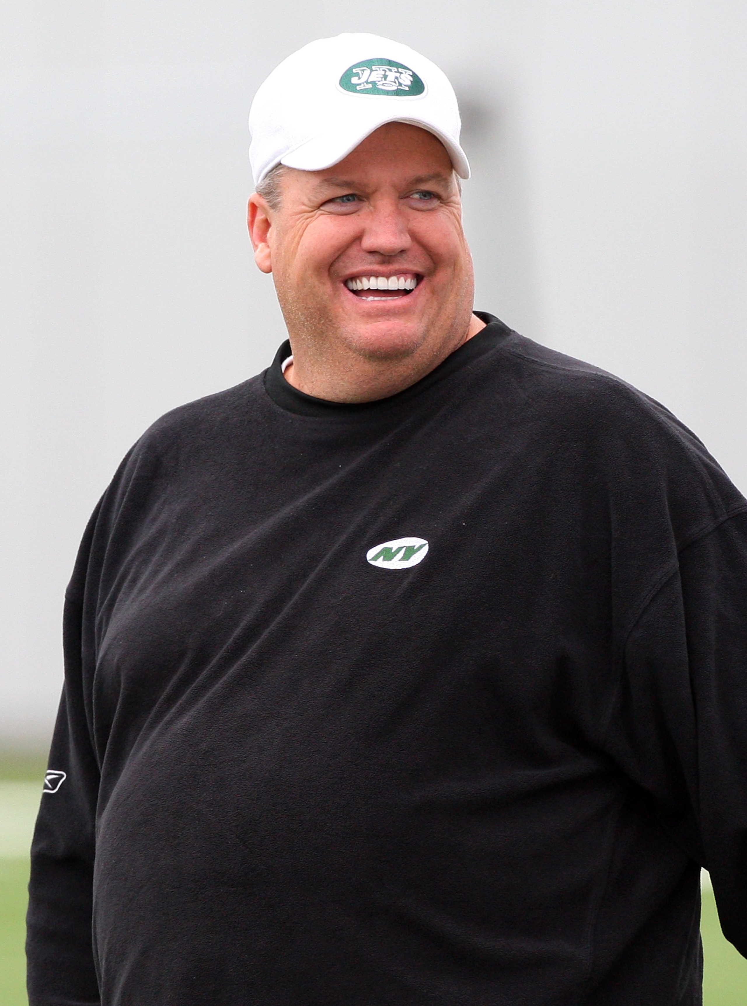 FLORHAM PARK, NJ - MAY 02:  Head coach Rex Ryan of the New York Jets walks on the field during minicamp on May 2, 2009 at the Atlantic Health Jets Training Center in Florham Park, New Jersey.  (Photo by Jim McIsaac/Getty Images)
