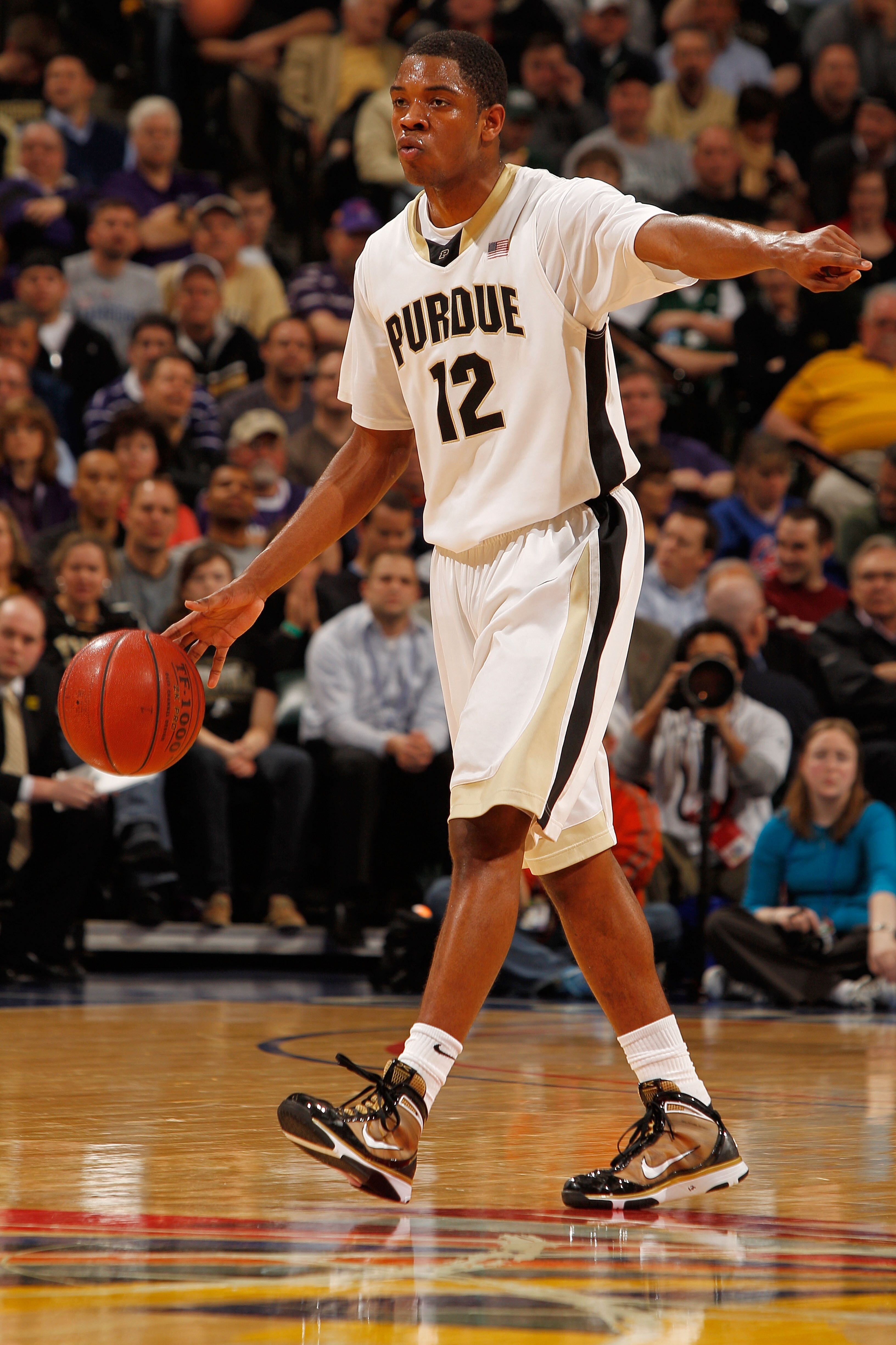 INDIANAPOLIS - MARCH 12:  Kelsey Barlow #12 of the Purdue Boilermakers dribbles the ball against the Northwestern Wildcats during the quarterfinals of the Big Ten Men's Basketball Tournament at Conseco Fieldhouse on March 12, 2010 in Indianapolis, Indiana