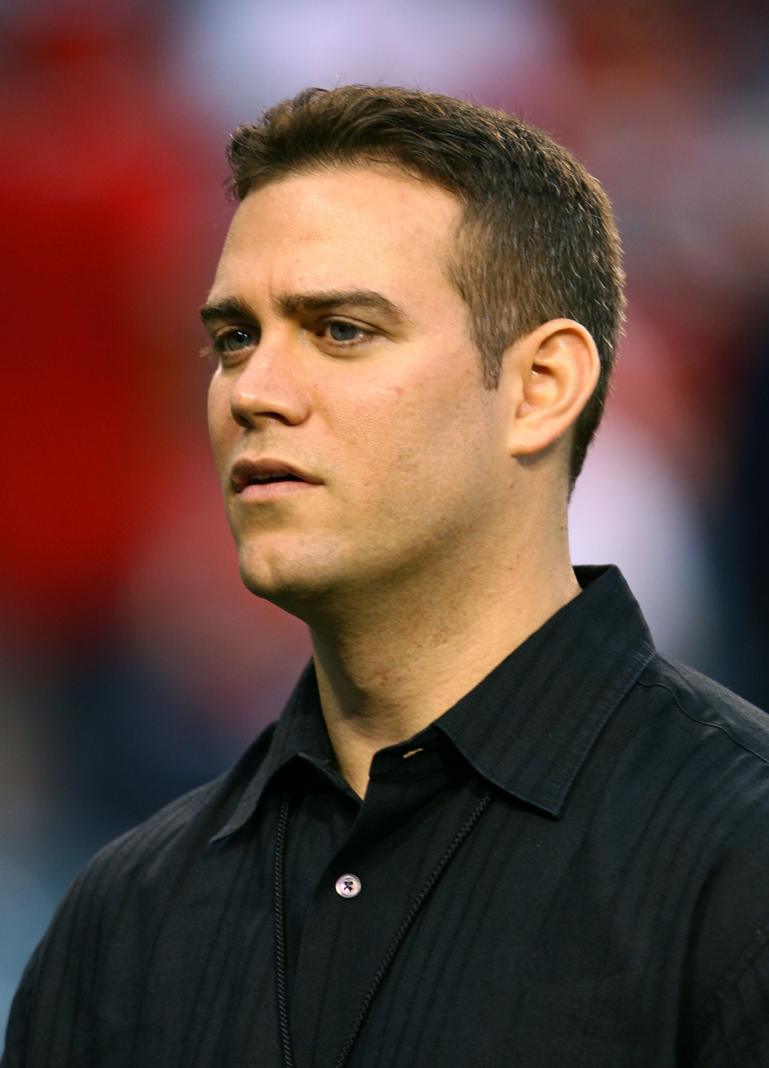 ANAHEIM, CA - OCTOBER 03:  General manager Theo Epstein of the Boston Red Sox watches batting practice before game two of the American League Division Series against the Los Angeles Angels of Anaheim at Angel Stadium on October 3, 2008 in Anaheim, Califor