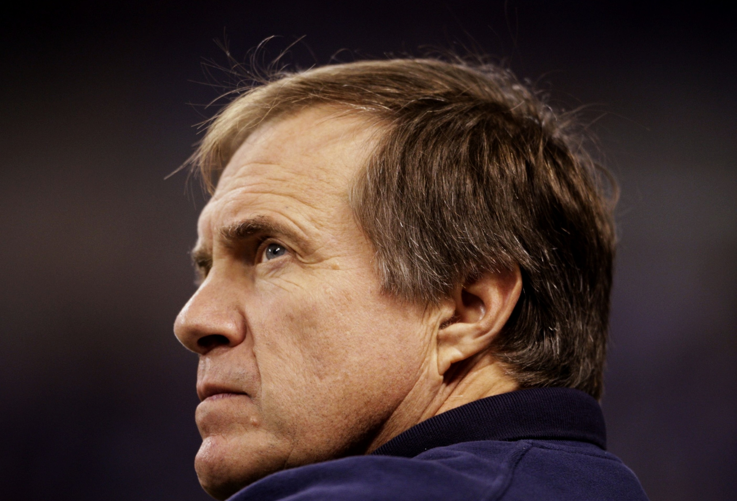 INDIANAPOLIS - NOVEMBER 15:  Head coach Bill Belichick of the New England Patriots looks on during warm ups before the game against the Indianapolis Colts at Lucas Oil Stadium on November 15, 2009 in Indianapolis, Indiana. (Photo by Andy Lyons/Getty Image