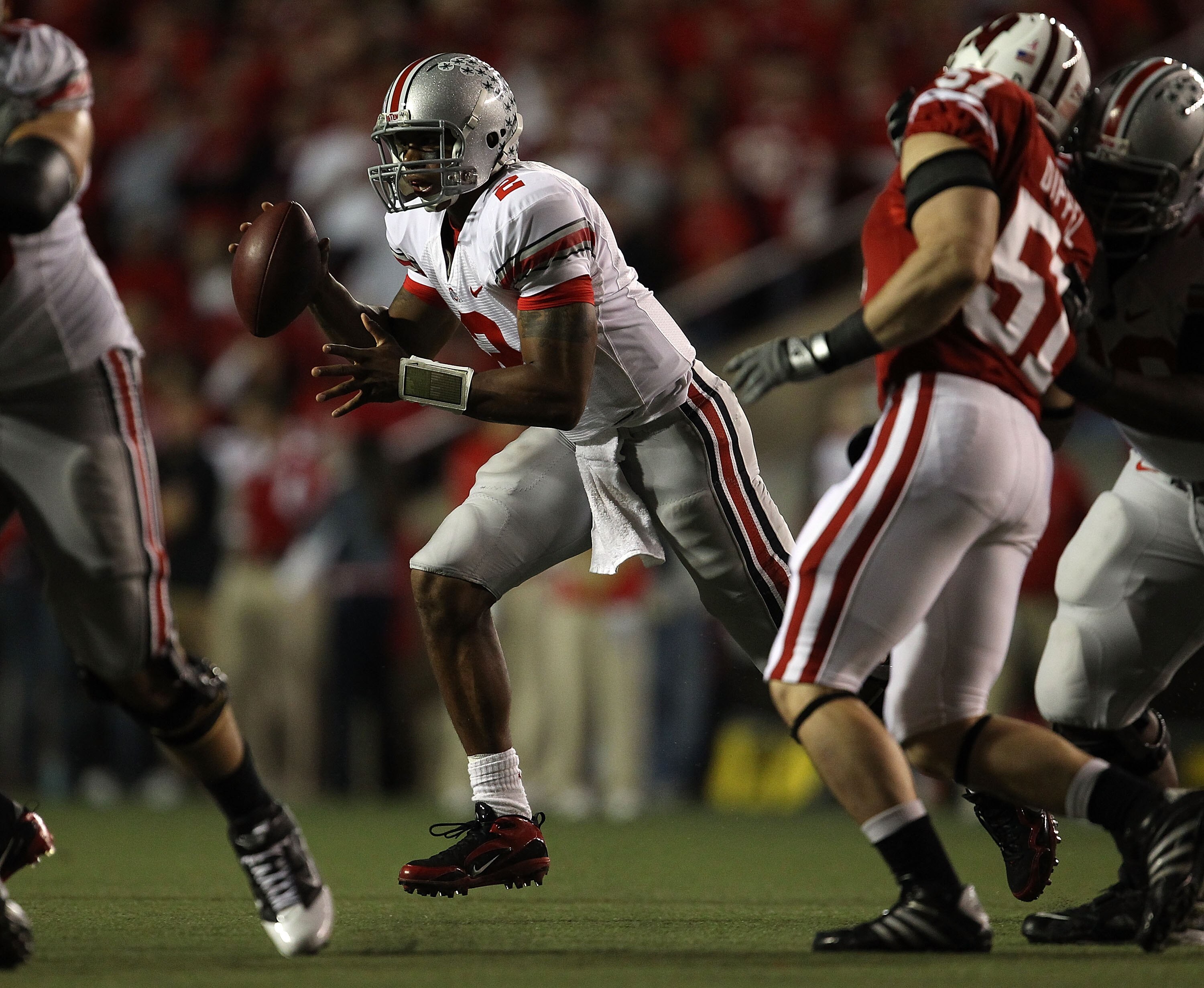 MADISON, WI - OCTOBER 16: Terrelle Pryor #2 of the Ohio State Buckeyes looks to hand-off against the Wisconsin Badgers at Camp Randall Stadium on October 16, 2010 in Madison, Wisconsin. (Photo by Jonathan Daniel/Getty Images)