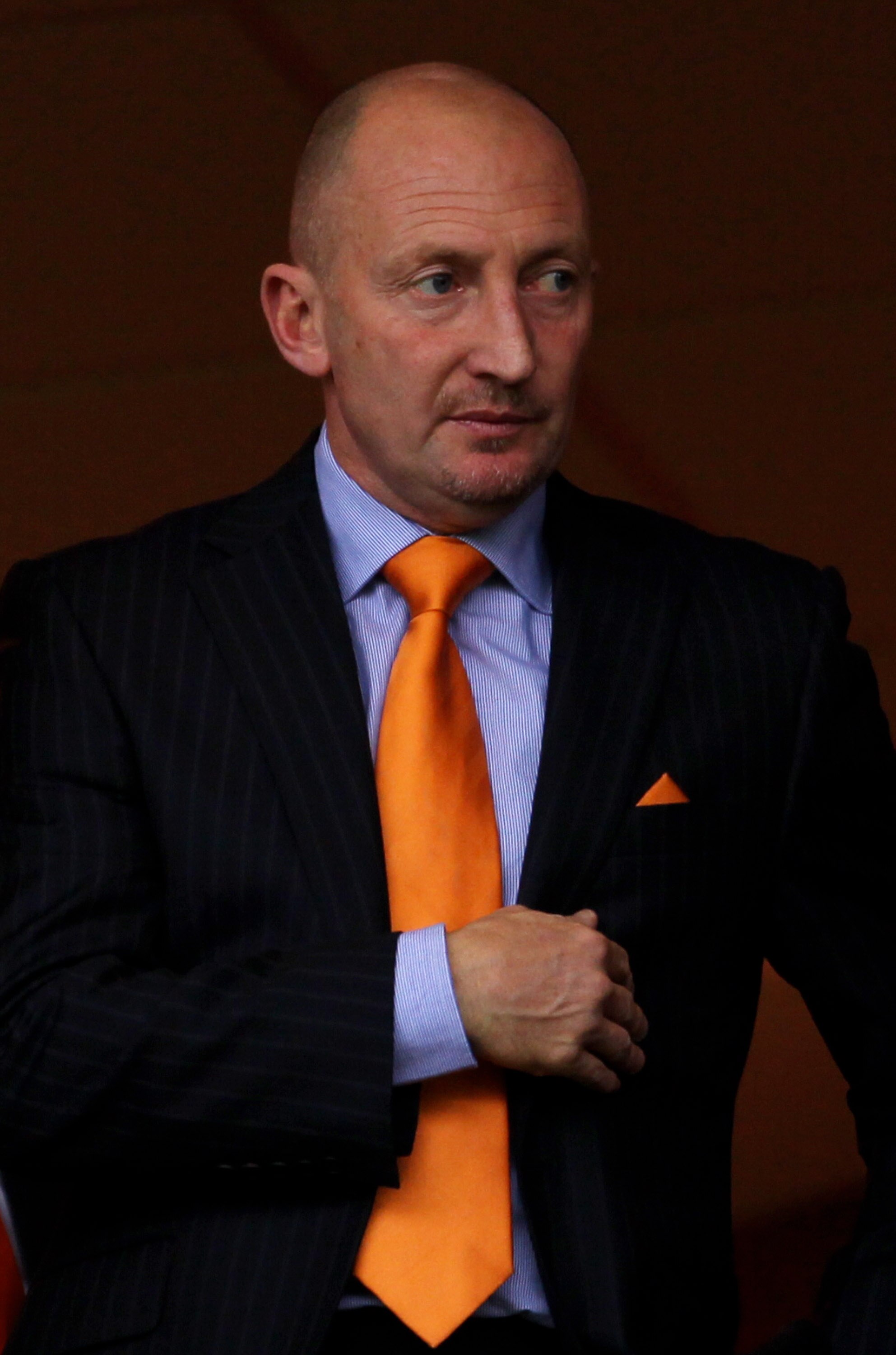 BLACKPOOL, ENGLAND - OCTOBER 17:   Blackpool Manager Ian Holloway takes his seat in the stands during the Barclays Premiership match between Blackpool and Manchester City at Bloomfield Road on October 17, 2010 in Blackpool, England. (Photo by Alex Livesey