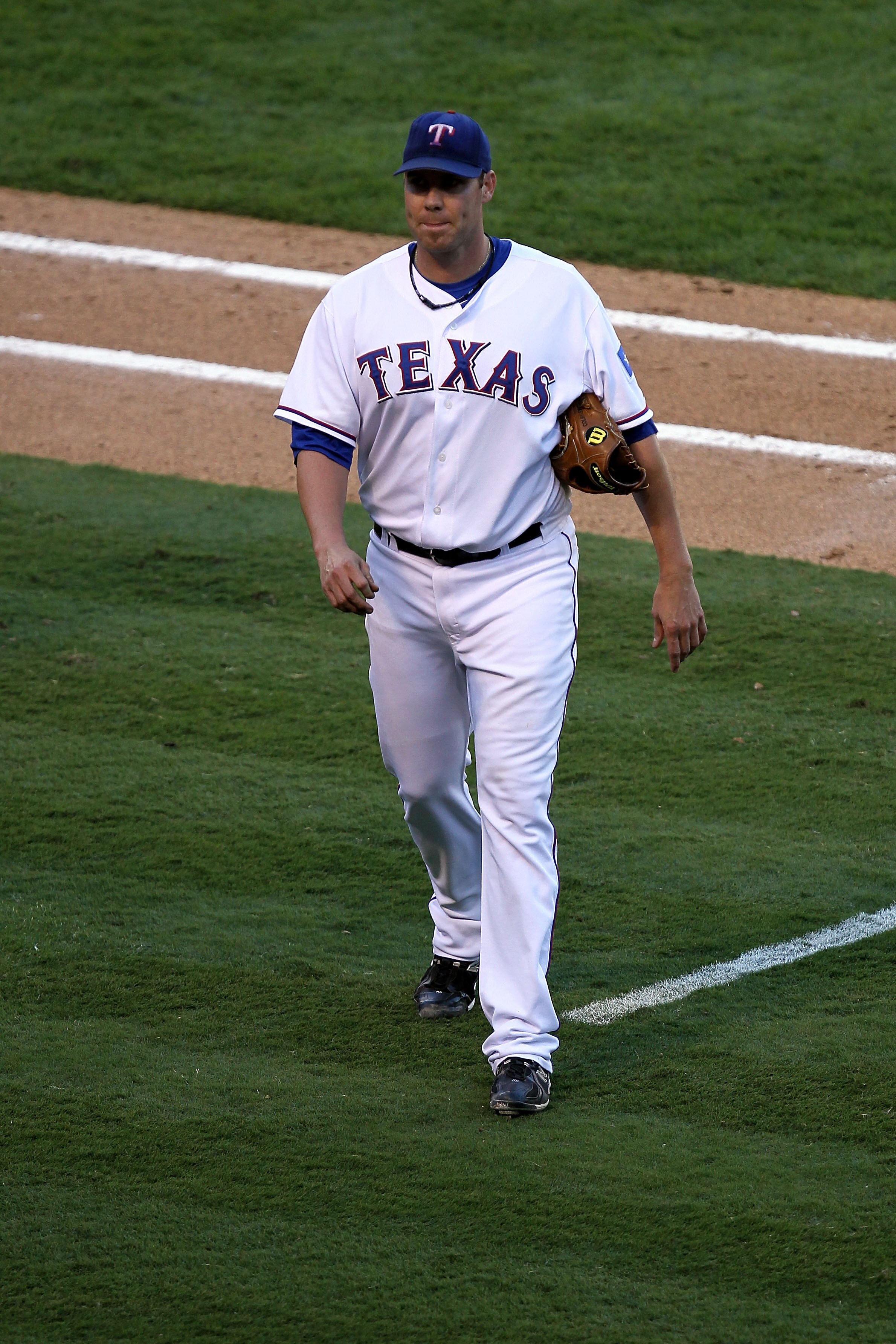 ARLINGTON, TX - OCTOBER 16: Colby Lewis #48 of the Texas Rangers comes out of the game in the top of the sixth inning against the New York Yankees in Game Two of the ALCS during the 2010 MLB Playoffs at Rangers Ballpark in Arlington on October 16, 2010 i ARLINGTON, TX - OCTOBER 16: Colby Lewis #48 of the Texas Rangers comes out of the game in the top of the sixth inning against the New York Yankees in Game Two of the ALCS during the 2010 MLB Playoffs at Rangers Ballpark in Arlington on October 16, 2010 i