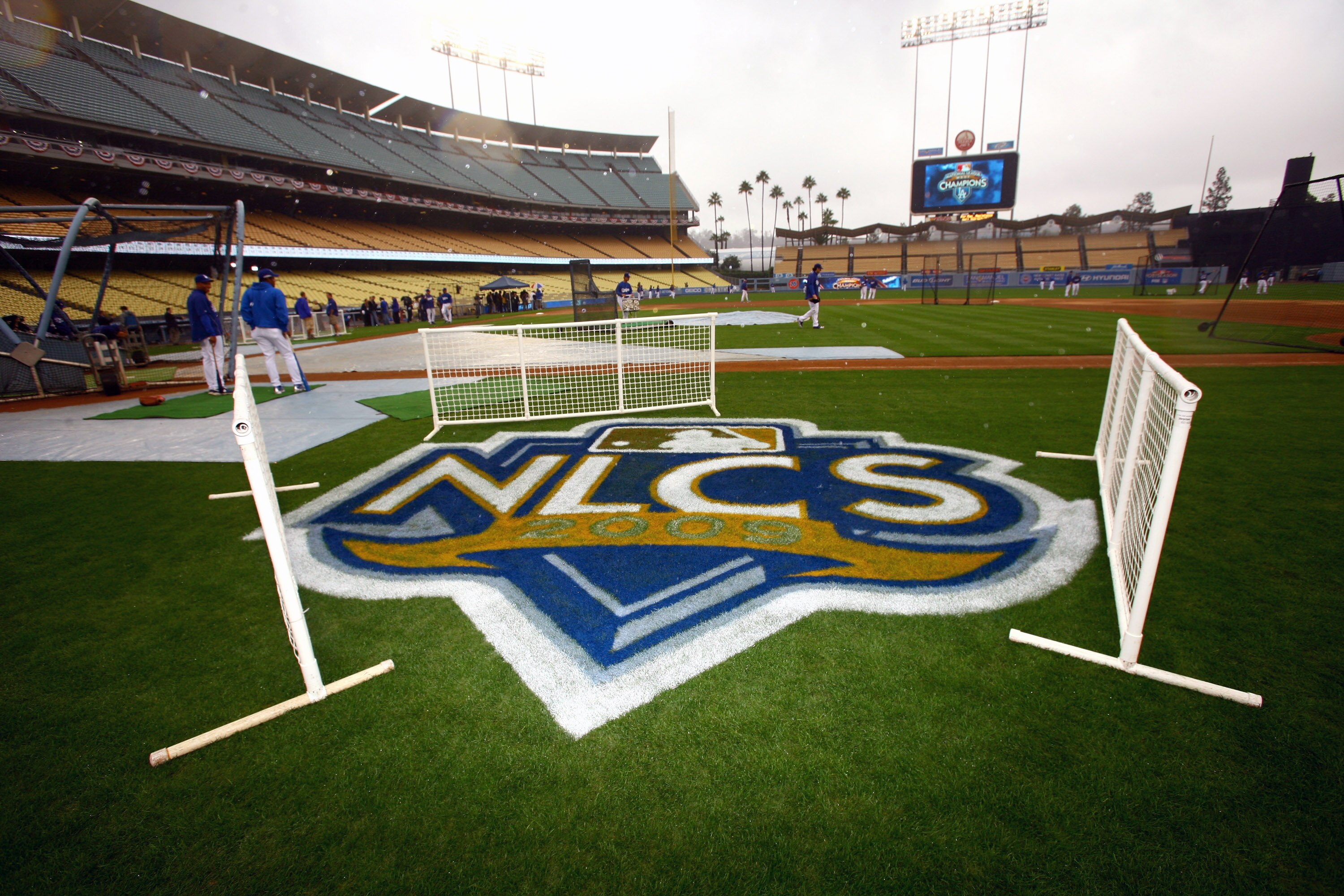 LOS ANGELES, CA - OCTOBER 14: The NLCS logo is protected on the field as the Los Angeles Dodgers work out for the NLCS against the Philadelphia Phillies on October 14, 2009 at Dodger Stadium in Los Angeles, California.  (Photo by Stephen Dunn/Getty Images
