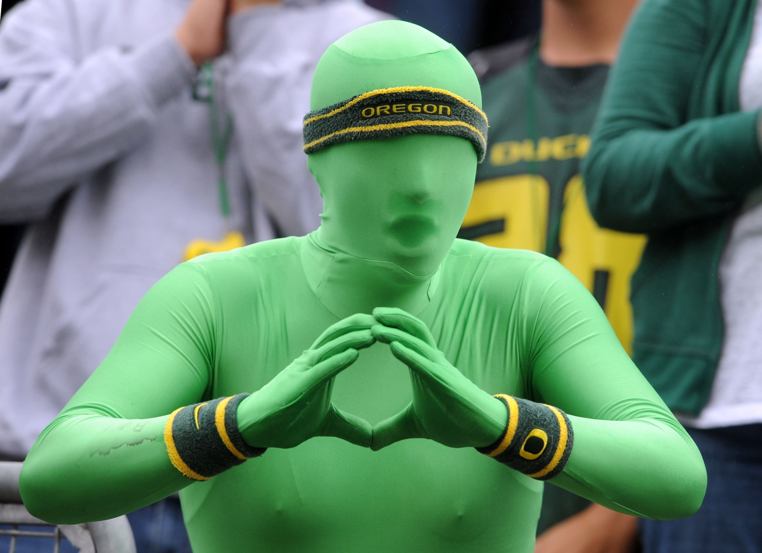 EUGENE, OR - SEPTEMBER 19: Oregon fan 'Greenman' cheers on his team in the first quarter of the game between the Utah Utes and the Oregon Ducks at Autzen Stadium on September 19, 2009 in Eugene, Oregon. Oregon won the game 31-24. (Photo by Steve Dykes/Get