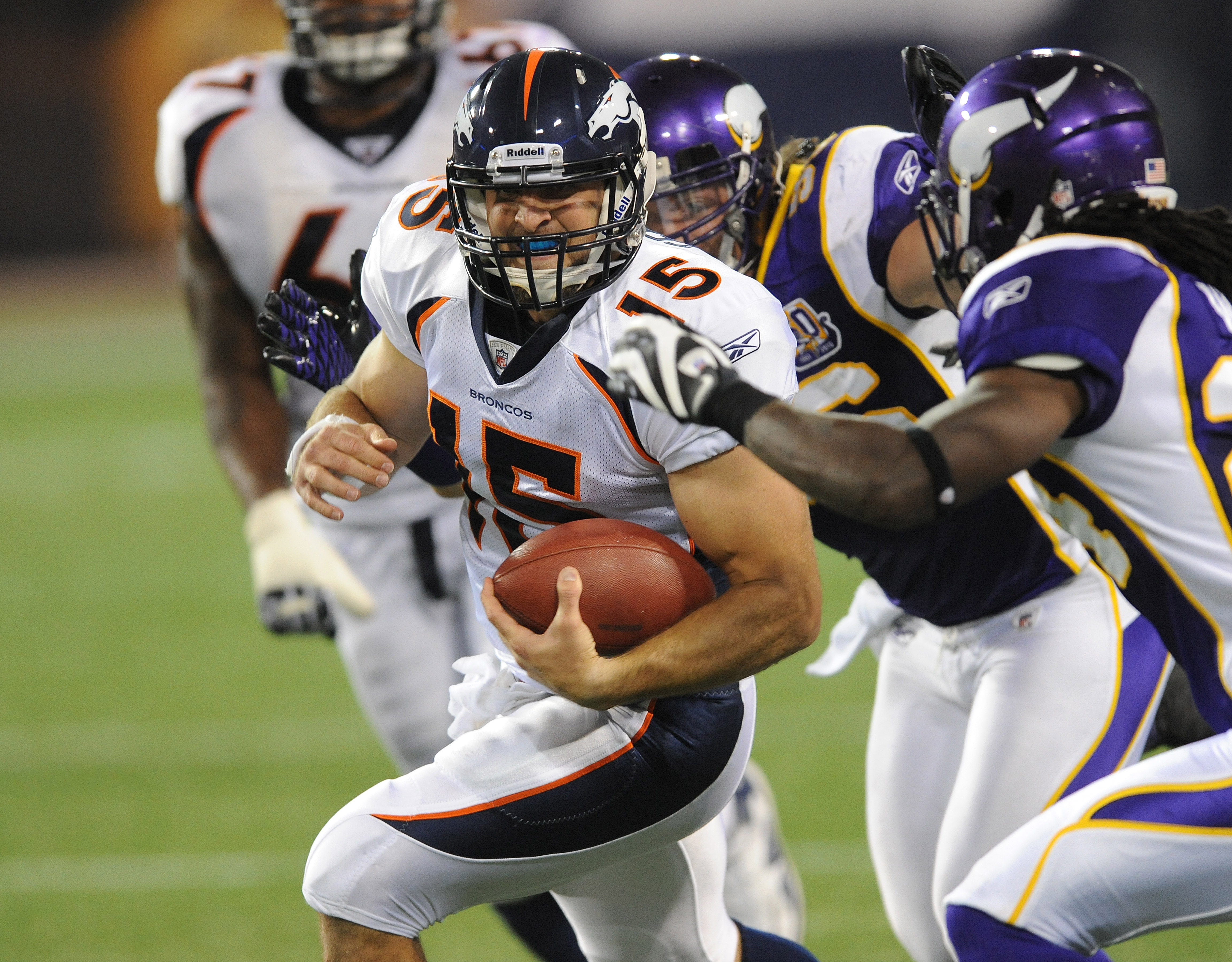 MINNEAPOLIS - SEPTEMBER 02:  Tim Tebow #15 of the Denver Broncos carries the ball during an NFL preseason game against the Minnesota Vikings at the Mall of America Field at Hubert H. Humphrey Metrodome, on September 2, 2010 in Minneapolis, Minnesota.  (Ph