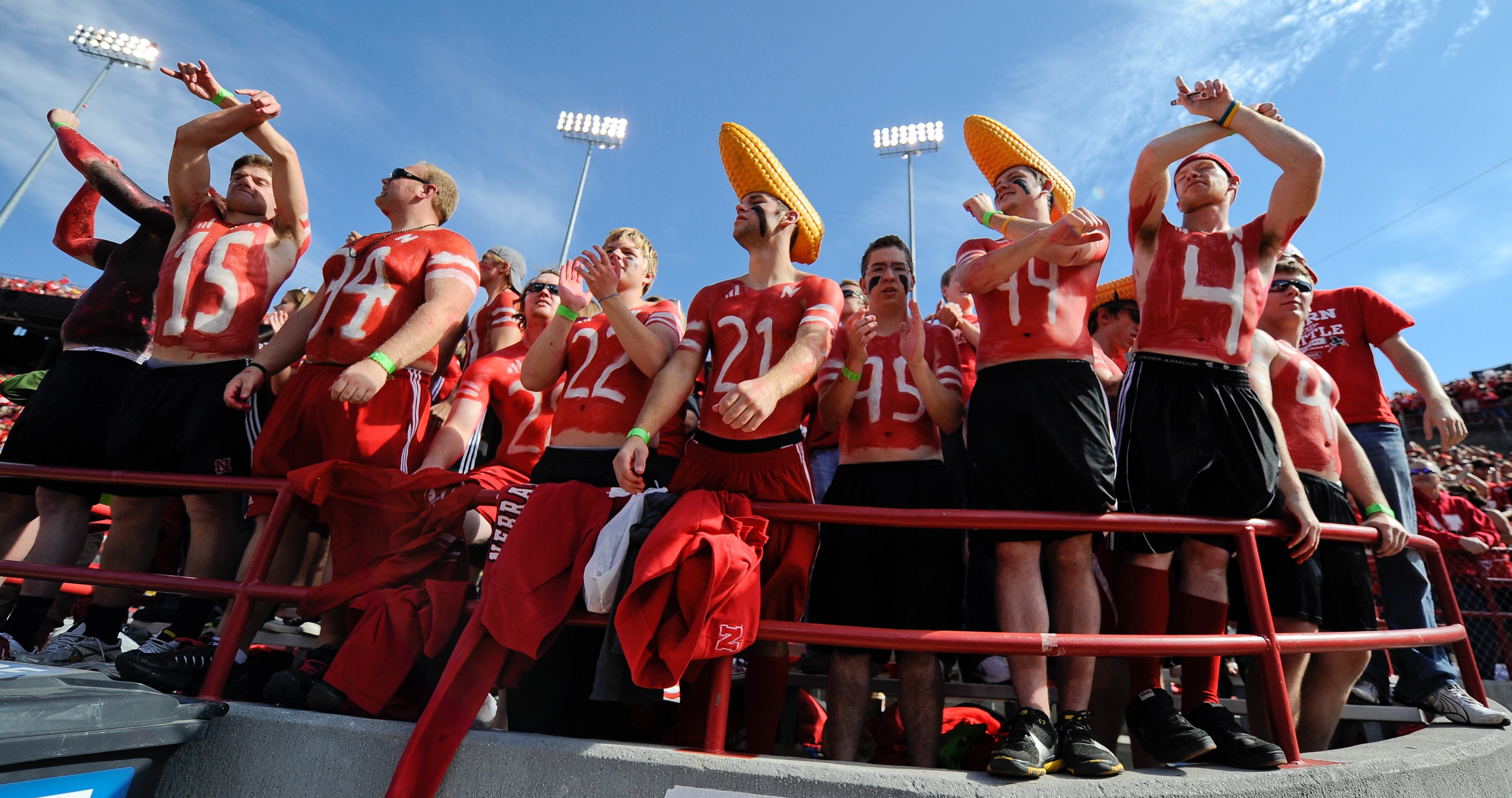 LINCOLN, NE - OCTOBER 16:  Fans of the Nebraska Cornhuskers cheer before the start of the game between the Texas Longhorns and the Nebraska Coranhuskers at Memorial Stadium on October 16, 2010 in Lincoln, Nebraska. Texas Defeated Nebraska 20-13. (Photo by