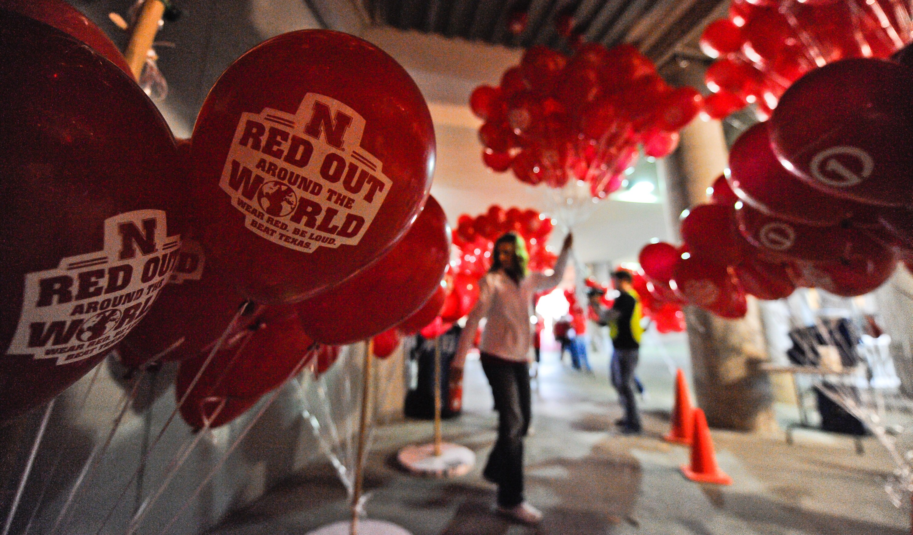 LINCOLN, NE - OCTOBER 16: Balloon vendors hand out balloons specially printed for the Nebraska Cornhuskers football game against the Texas Longhorns at Memorial Stadium on October 16, 2010 in Lincoln, Nebraska.  (Photo by Eric Francis/Getty Images)