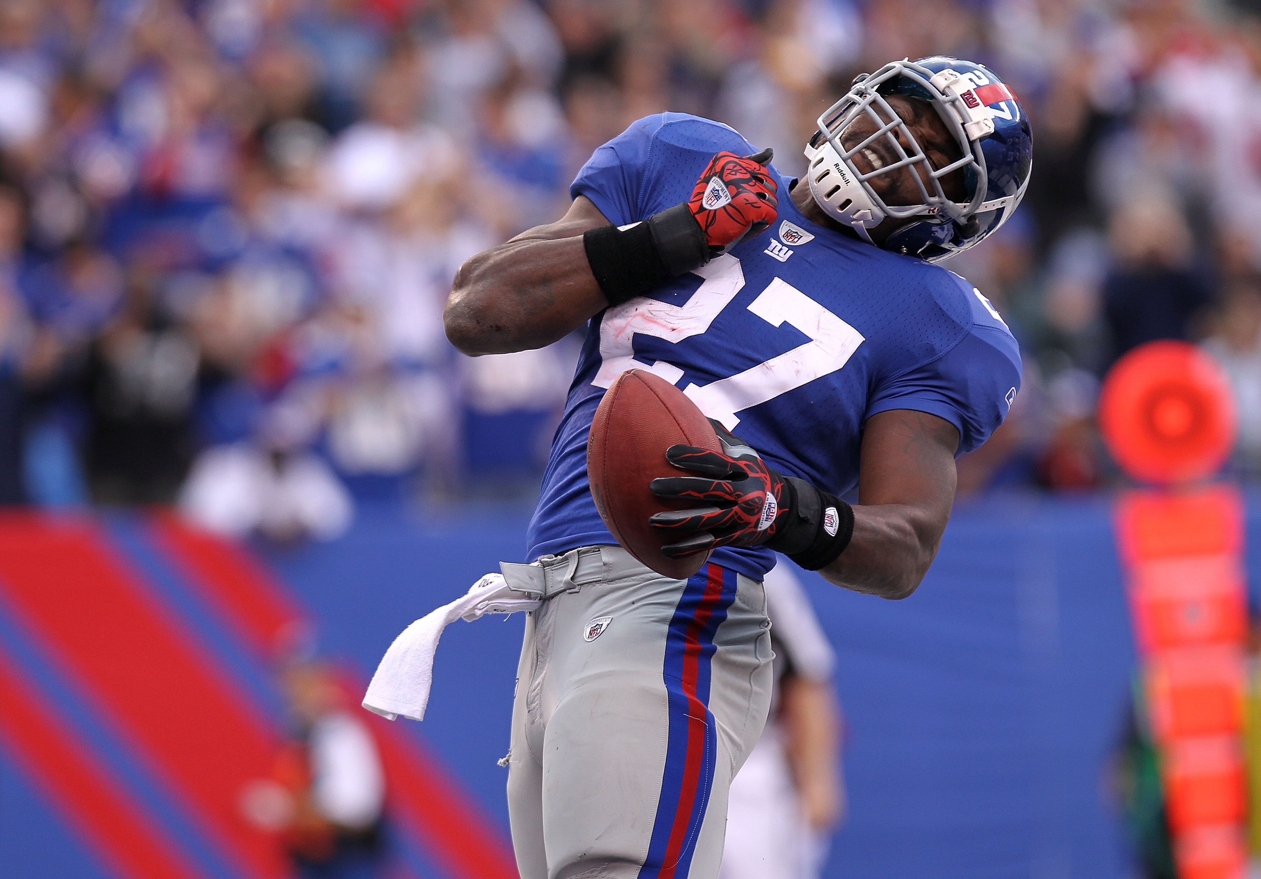 EAST RUTHERFORD, NJ - OCTOBER 17:  Brandon Jacobs #27 of the New York Giants celebrates his fourth quarter touchdown against  the Detroit Lions at New Meadowlands Stadium on October 17, 2010 in East Rutherford, New Jersey.  (Photo by Nick Laham/Getty Imag