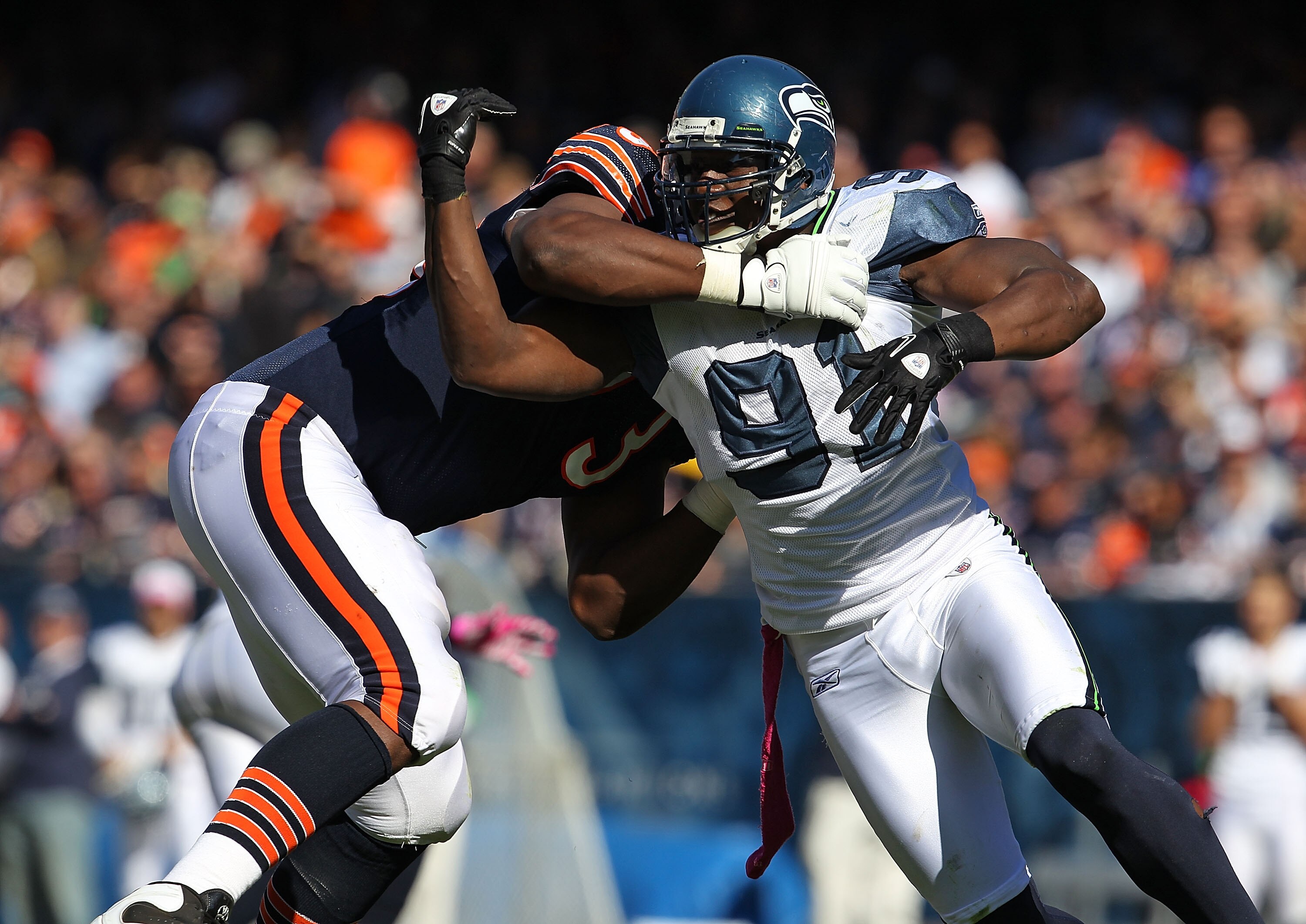 CHICAGO - OCTOBER 17: Chris Clemons #91 of the Seattle Seahawks rushes against J'Marcus Webb #73 of the Chicago Bears at Soldier Field on October 17, 2010 in Chicago, Illinois. The Seahawks defeated the Bears 23-20. (Photo by Jonathan Daniel/Getty Images)