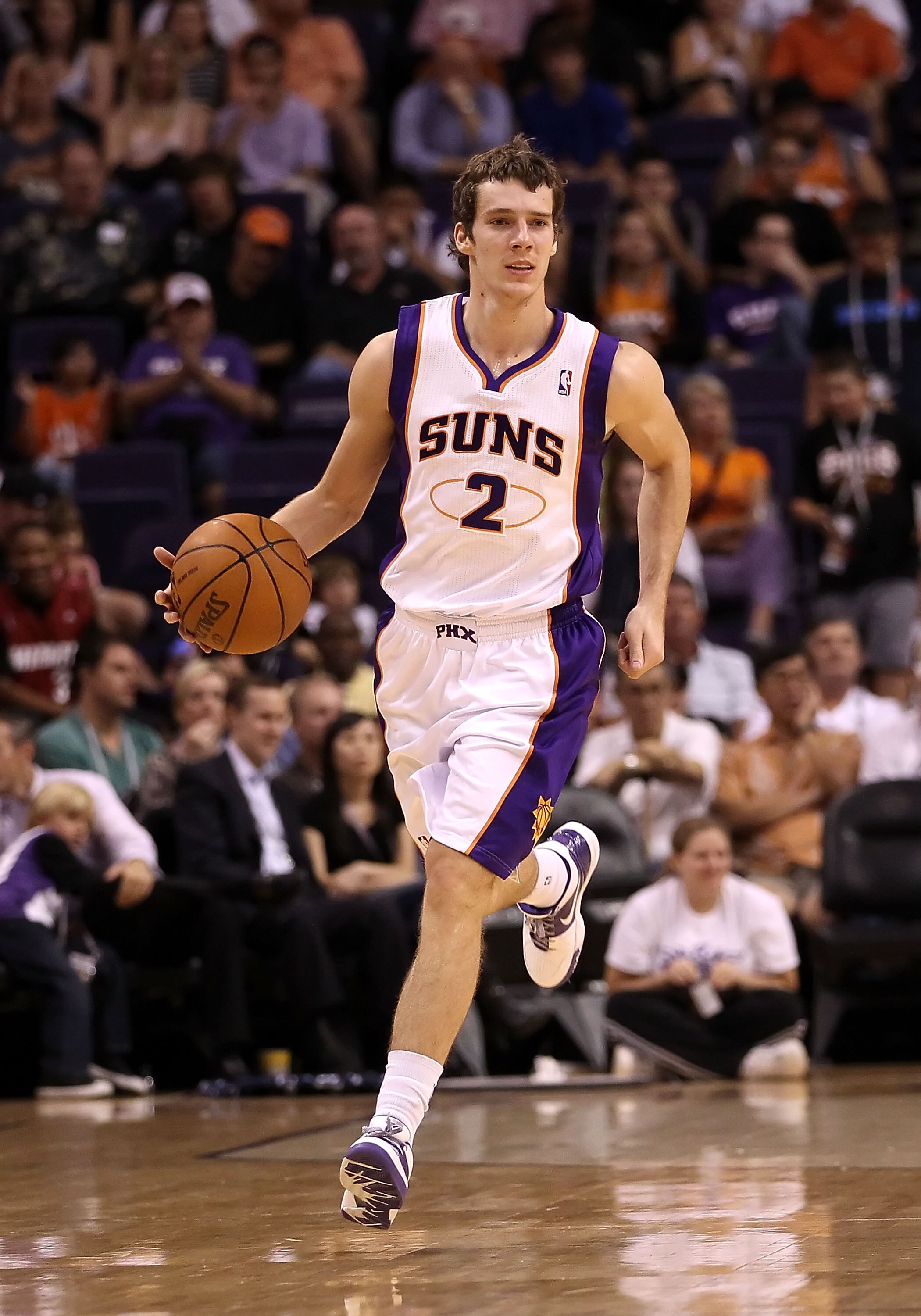 PHOENIX - OCTOBER 12:  Goran Dragic #2 of the Phoenix Suns handles the ball during the preseason NBA game against the Utah Jazz at US Airways Center on October 12, 2010 in Phoenix, Arizona. NOTE TO USER: User expressly acknowledges and agrees that, by dow